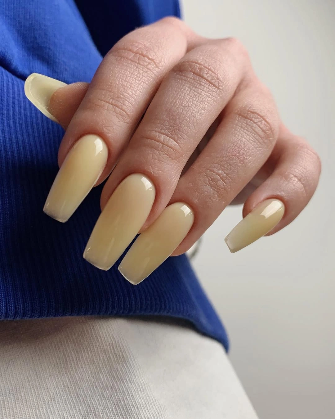 creamy caramel square nails on medium skin