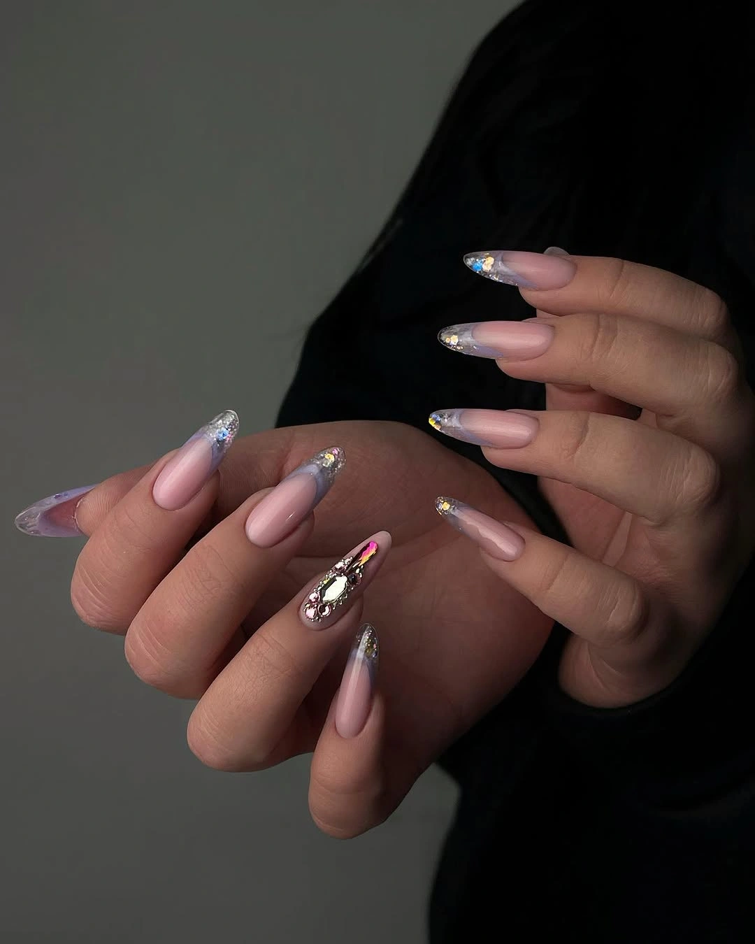 clear glitter tips with one ornate accent nail