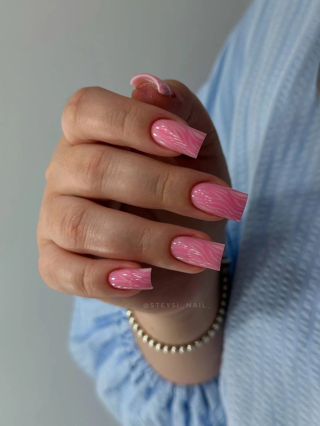 glossy pink square nails with tonal stripes