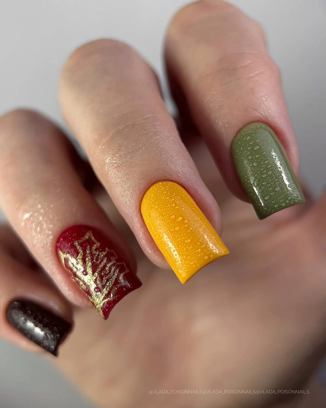 short nails mixing olive yellow burgundy and black accents