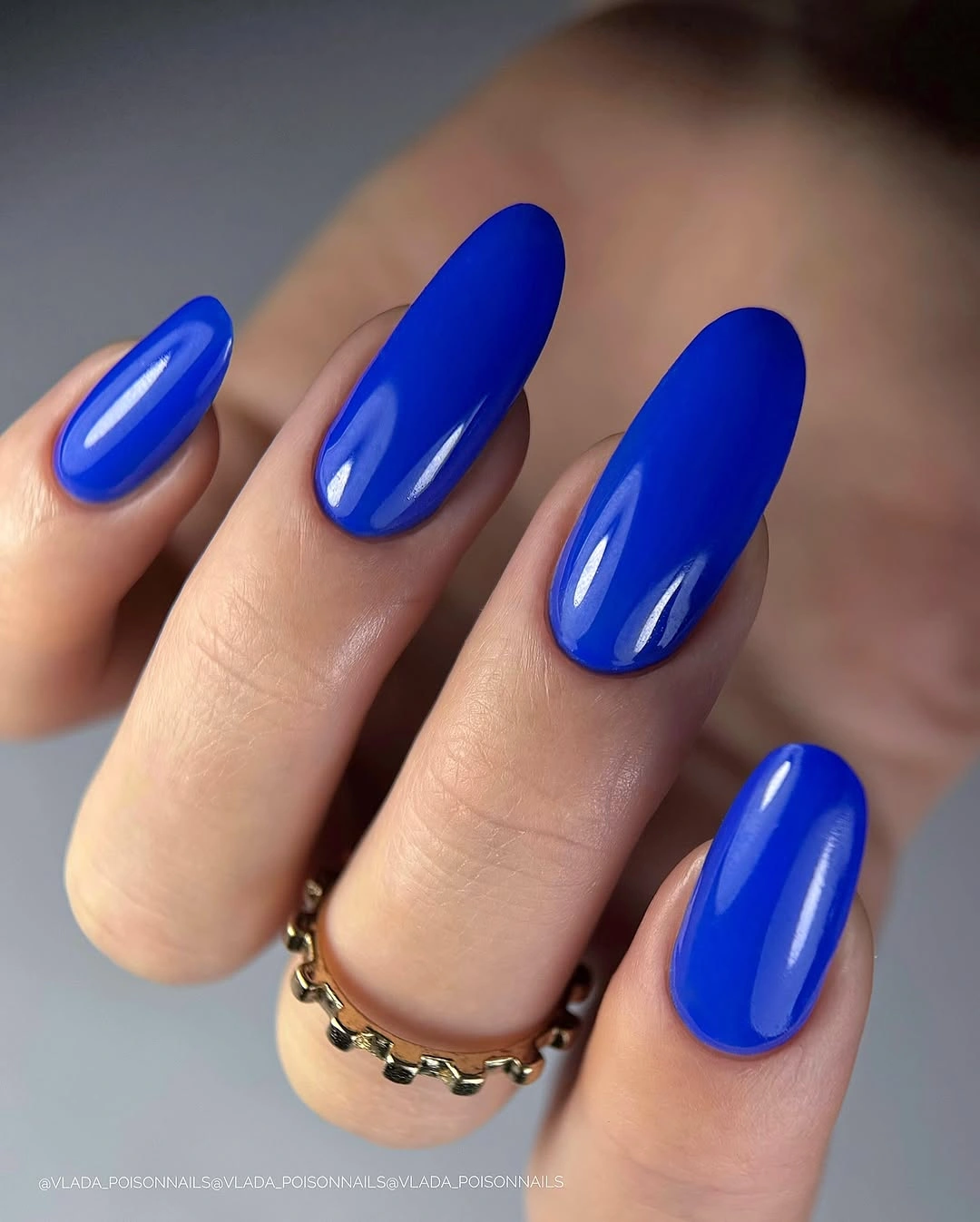 long almond nails in vivid glossy royal blue