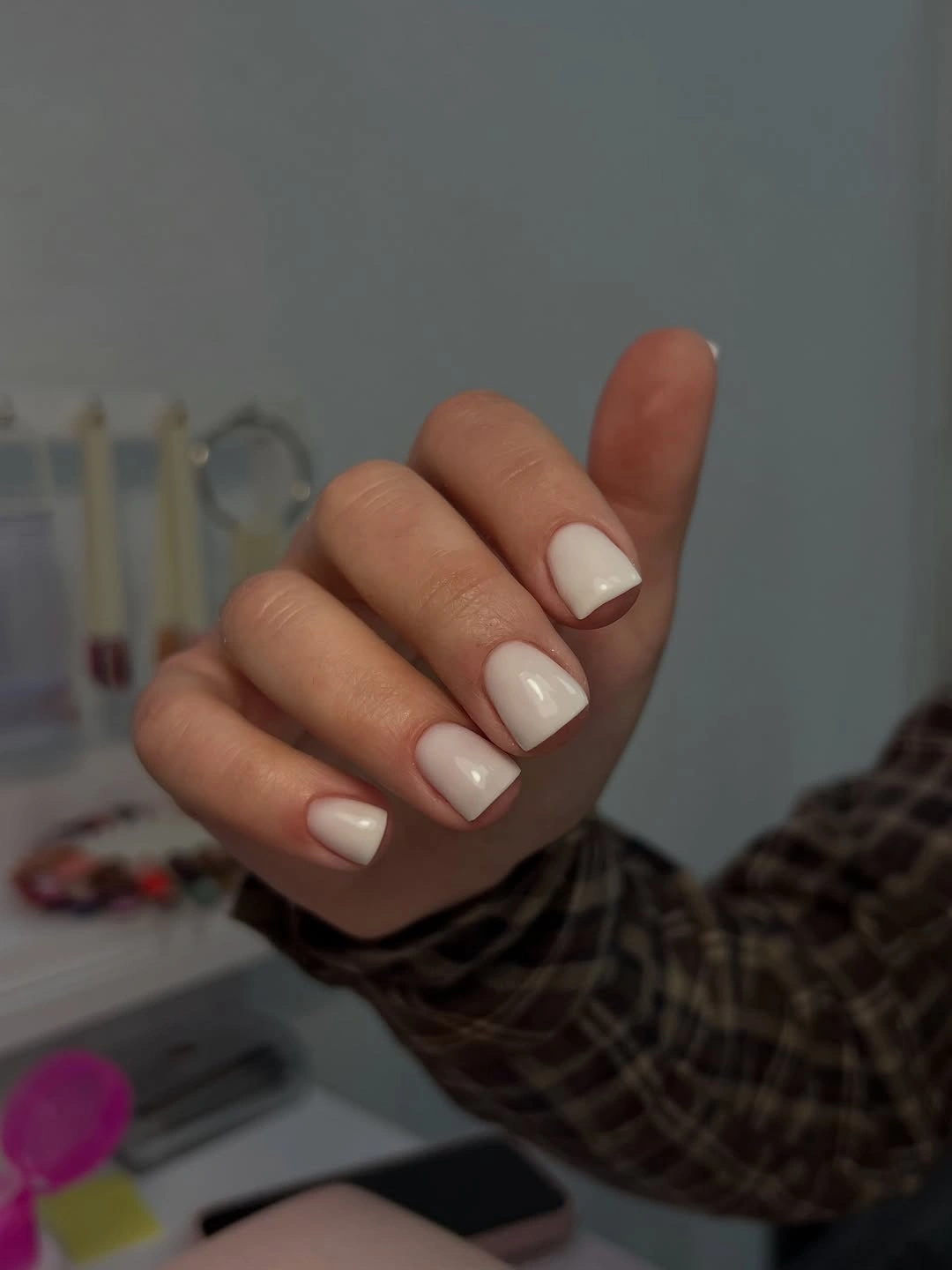 short rounded-square nails in a soft nude pink