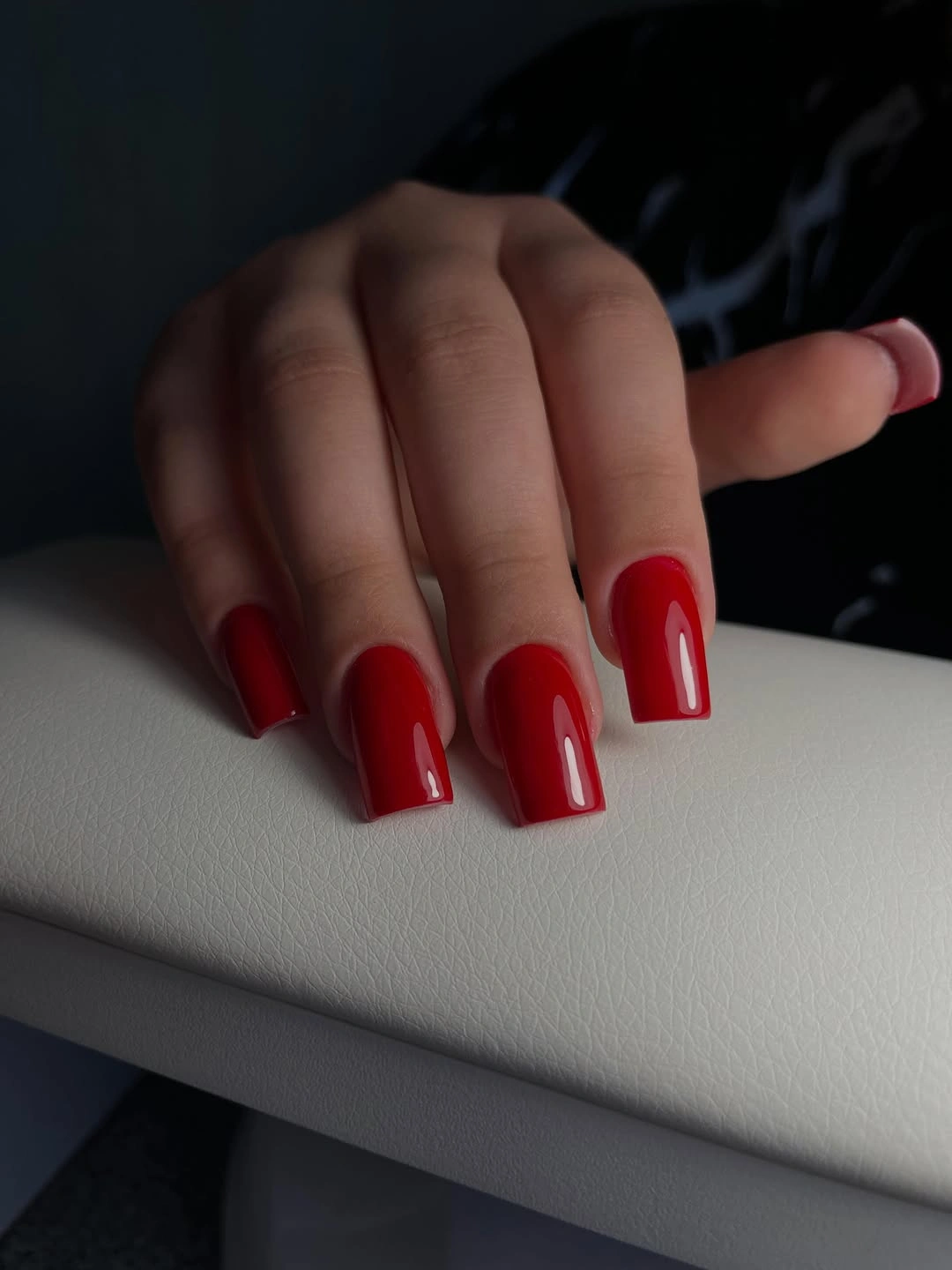 medium-square nails in a saturated glossy red