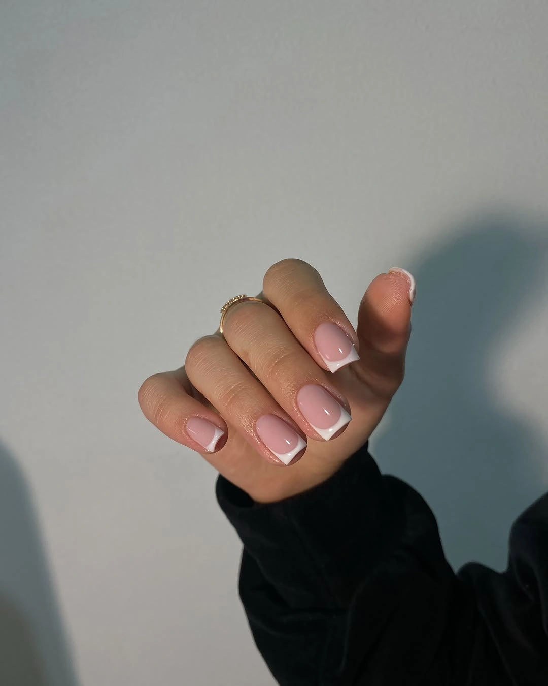 Short glossy blush pink square nails with rounded corners