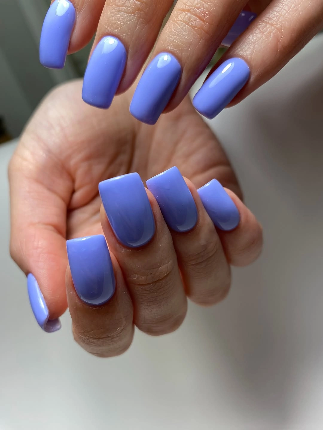 glossy periwinkle blue square manicure