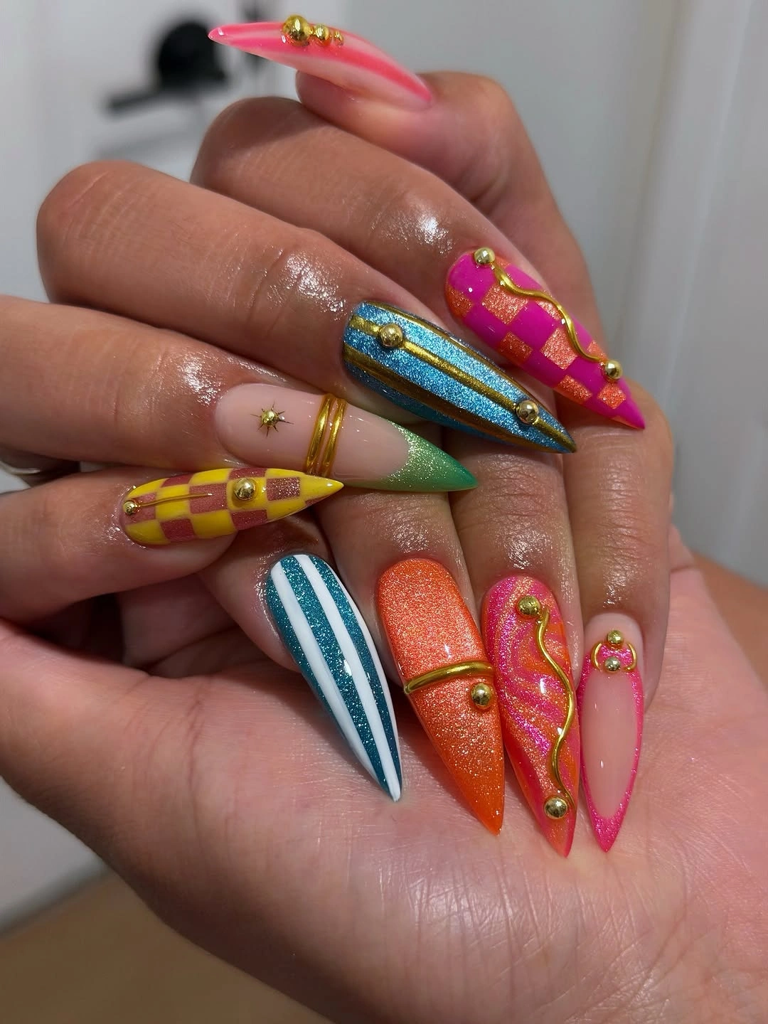 Vivid pink orange turquoise and yellow stiletto nail panels