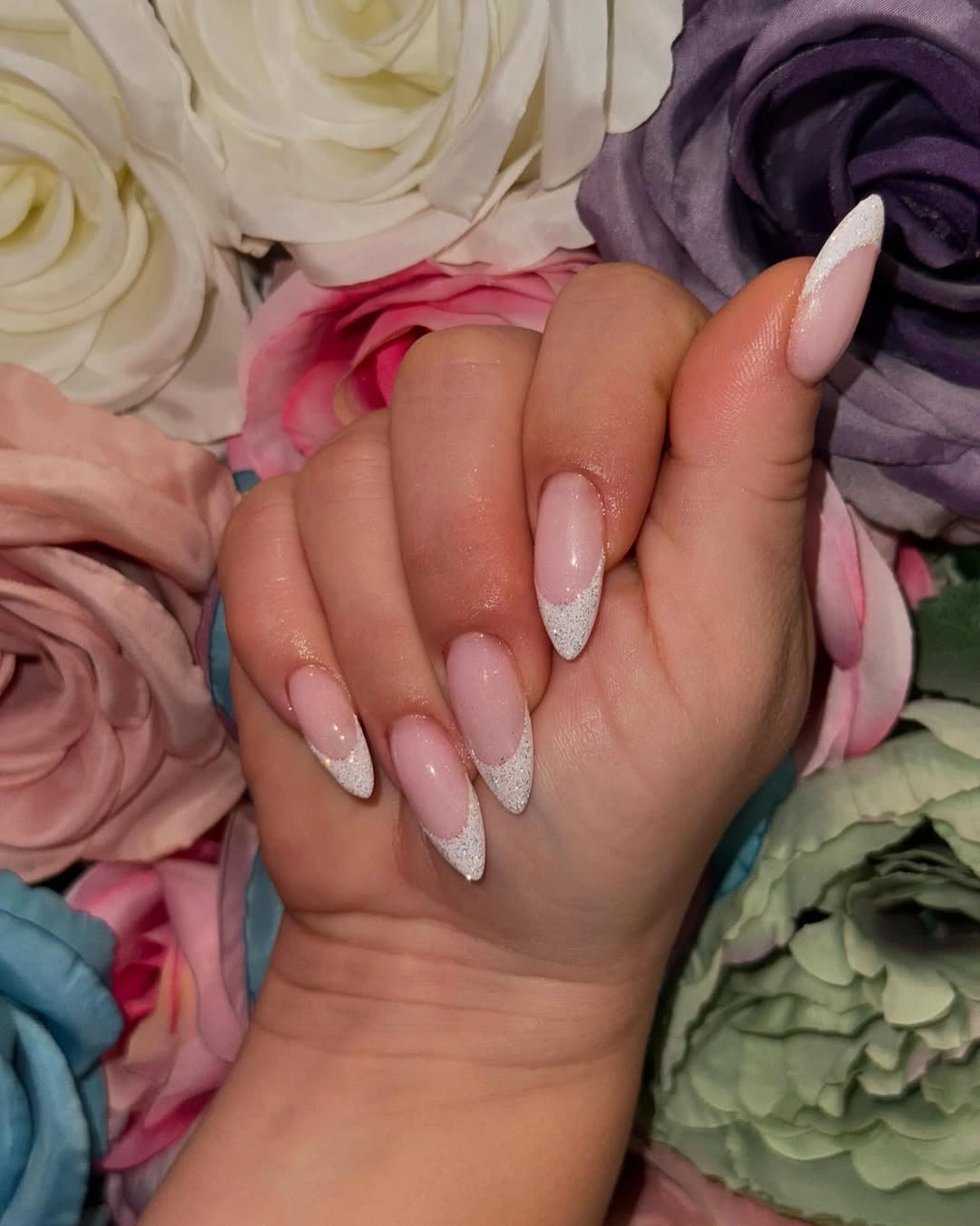 Long almond nails with white glitter French tips