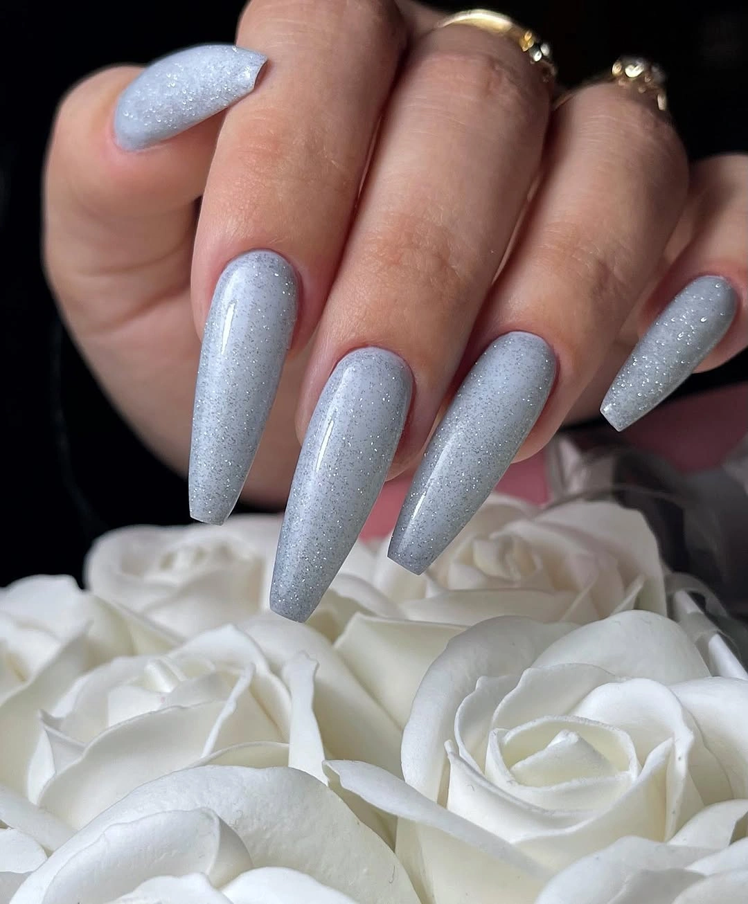 Long tapered silver blue shimmer nails
