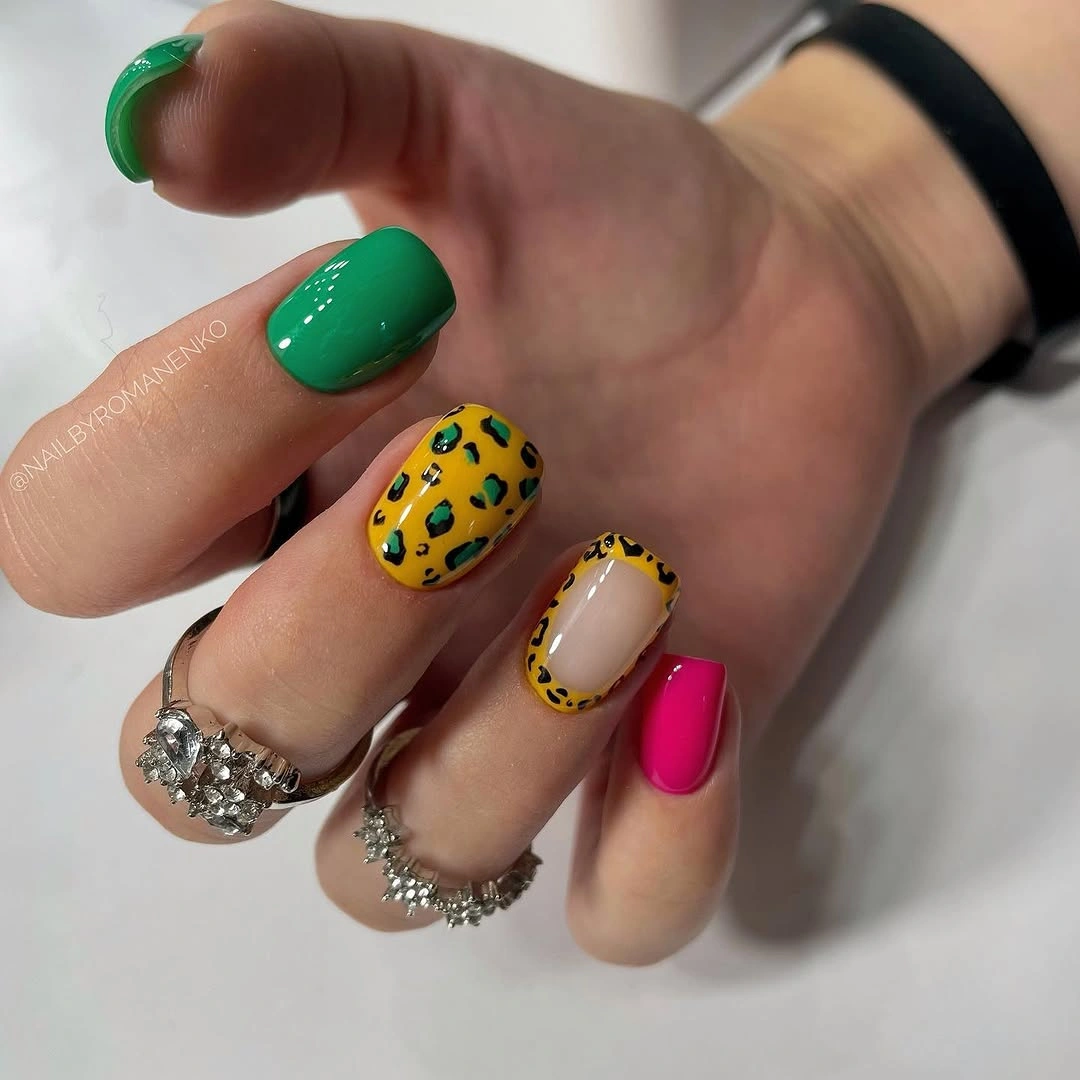 Short emerald yellow nude and magenta accent nails