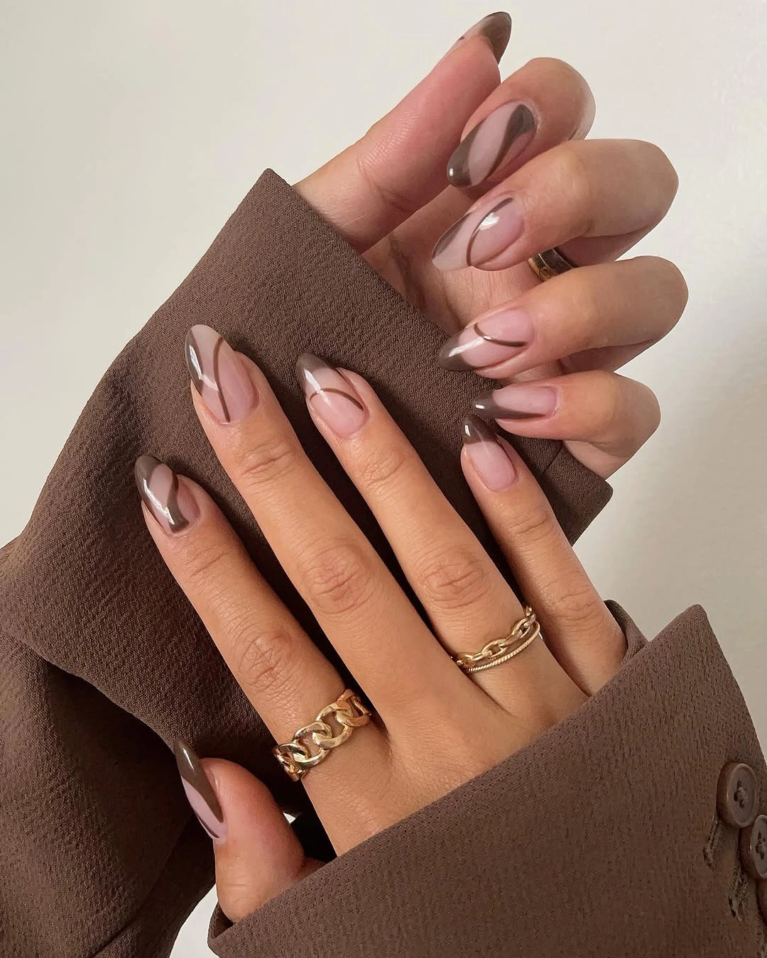 Nude square nails with bright green curved tips