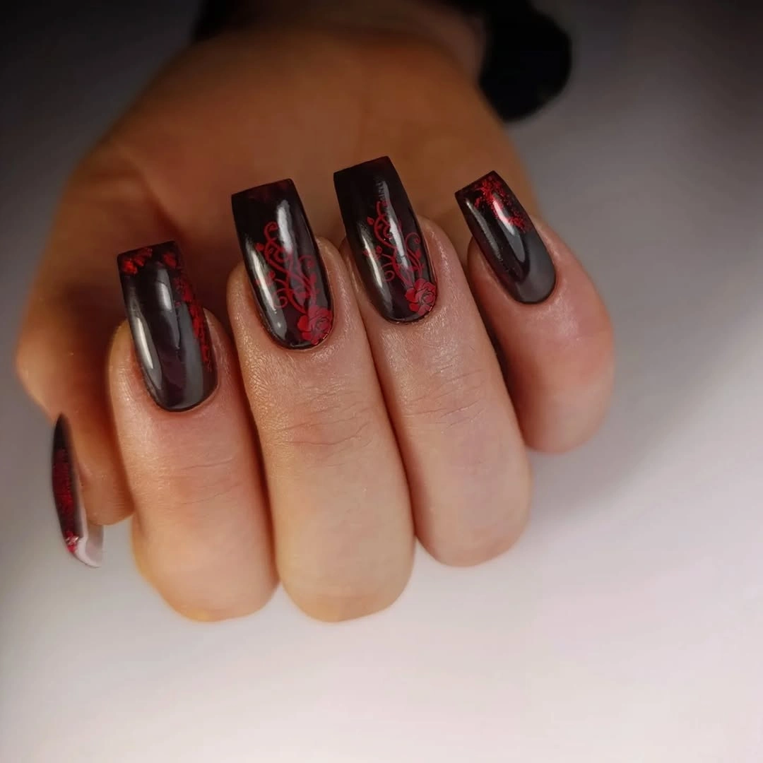Burgundy square nails with dark reflective center panels