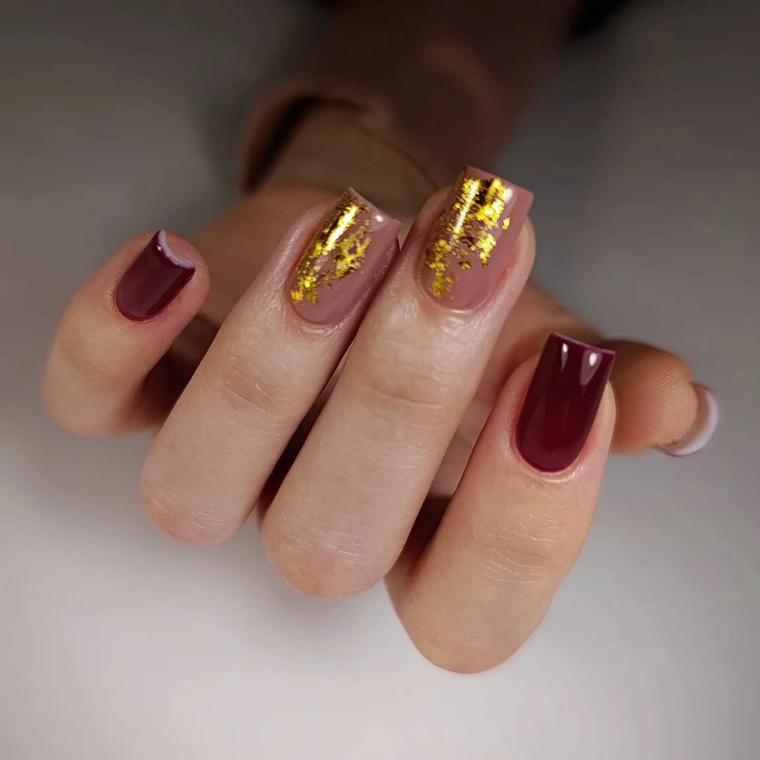 Glossy deep wine square nails in a solid finish