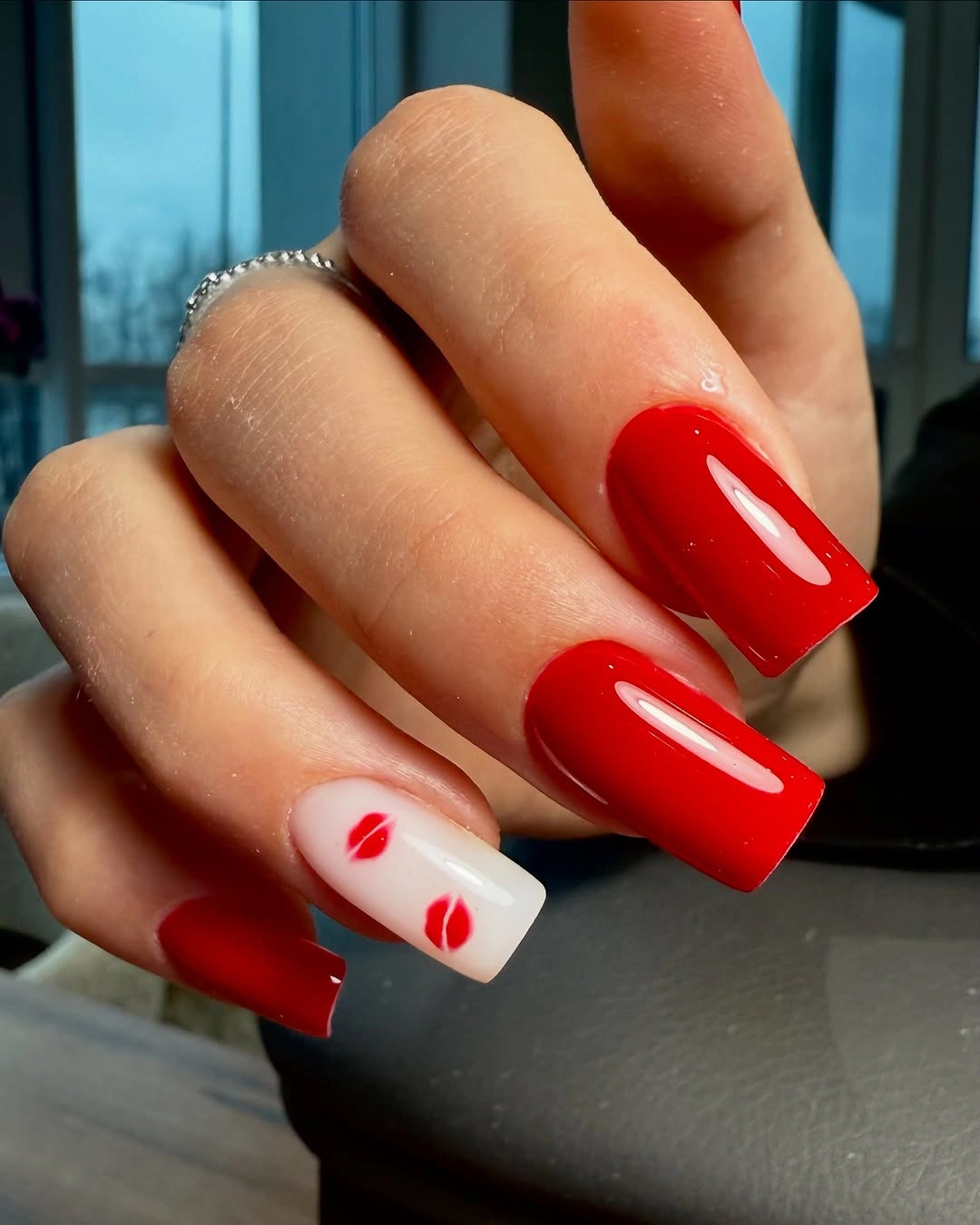 Long red square nails with white accent