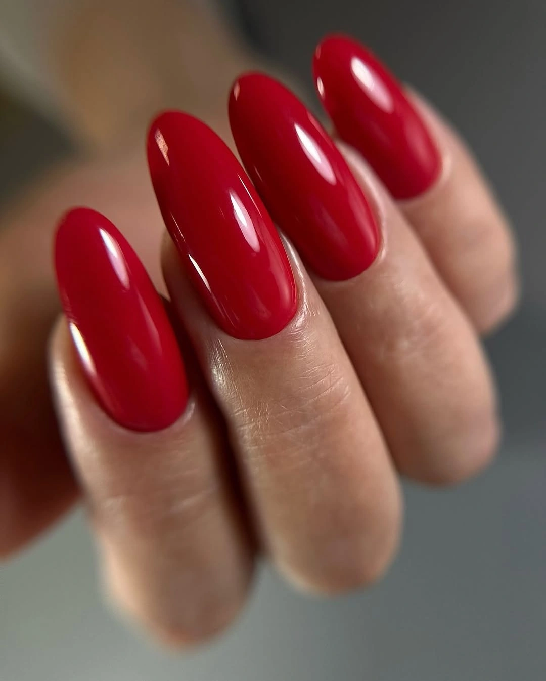 Berry red oval almond glossy nails