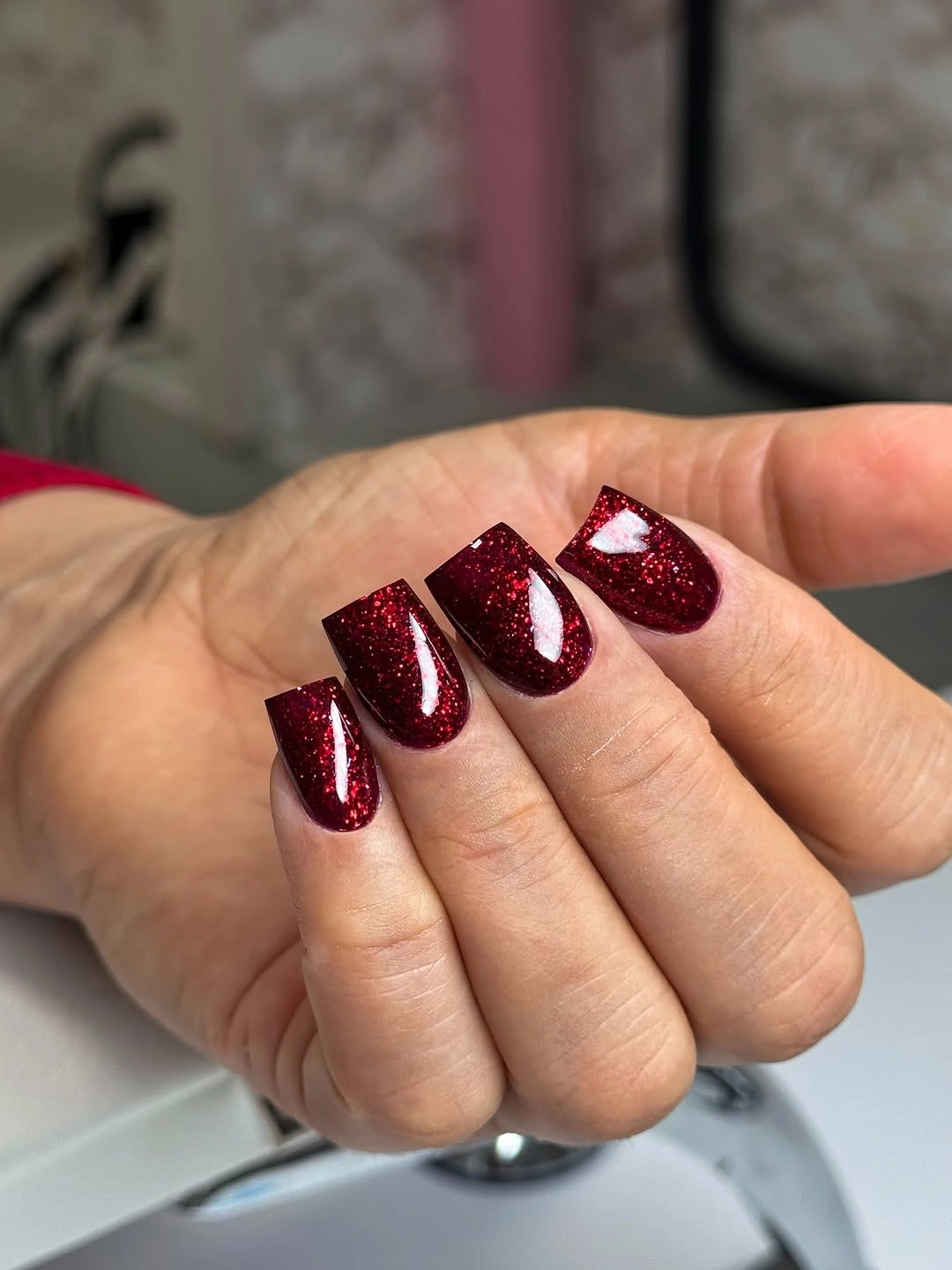 Dark red glitter square manicure