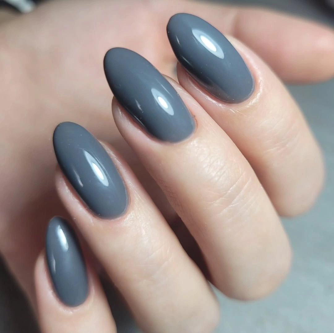 Glossy slate blue medium rounded almond nails