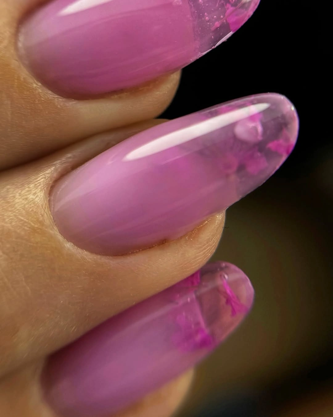 Glossy translucent pink medium almond nails