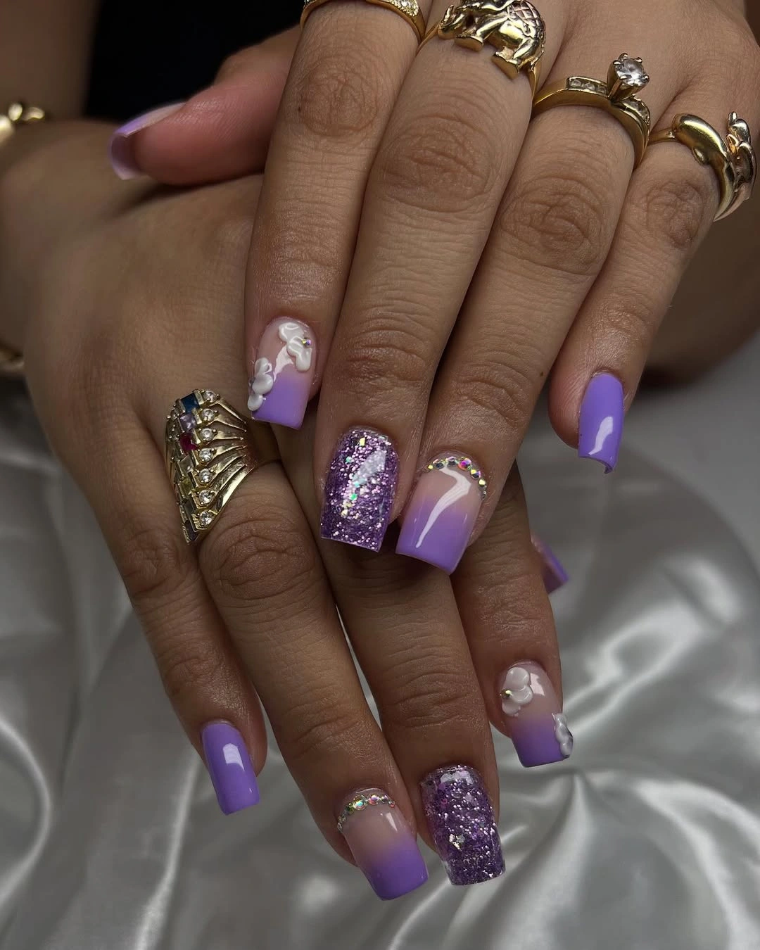 Short lavender coffin nails with pink sections and purple glitter