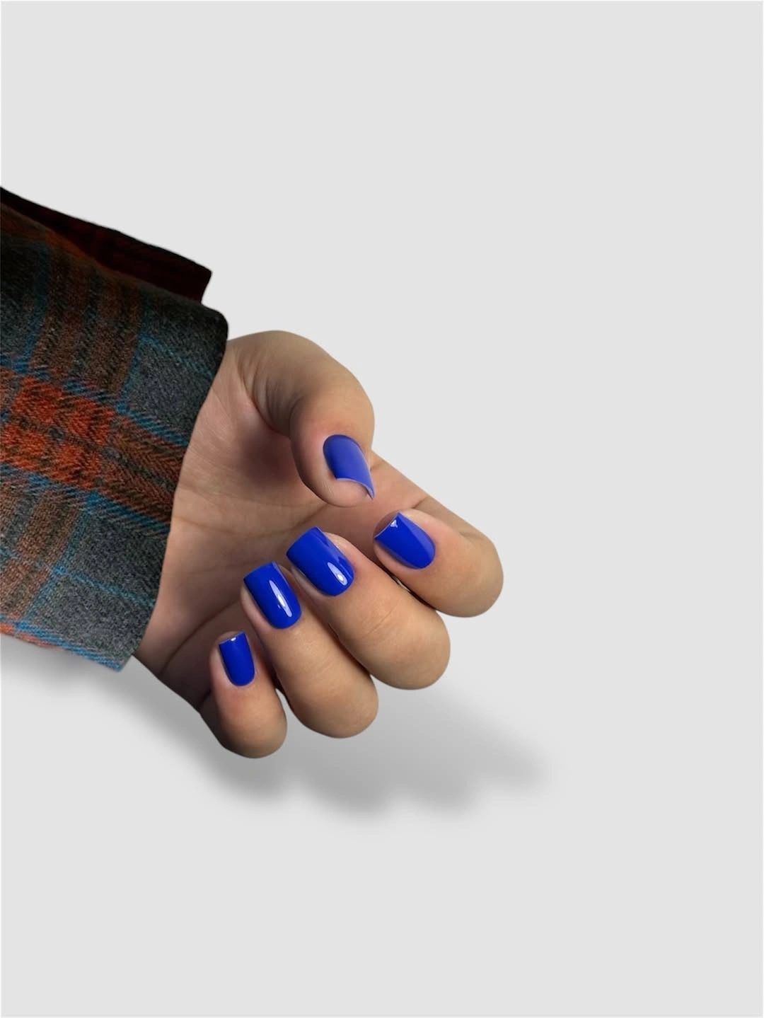 Short glossy cobalt blue square nails