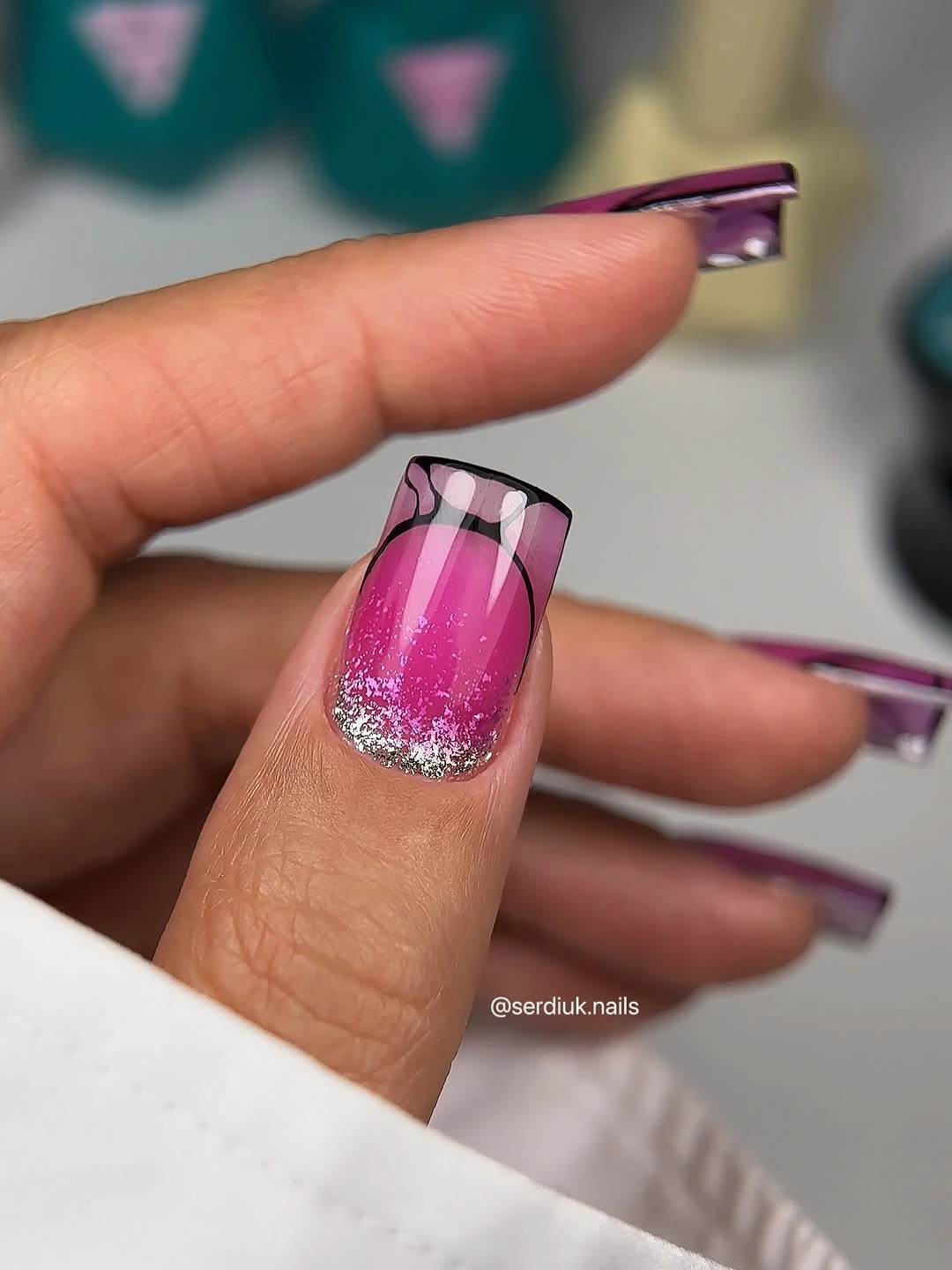 Medium square pink nails with reflective edging