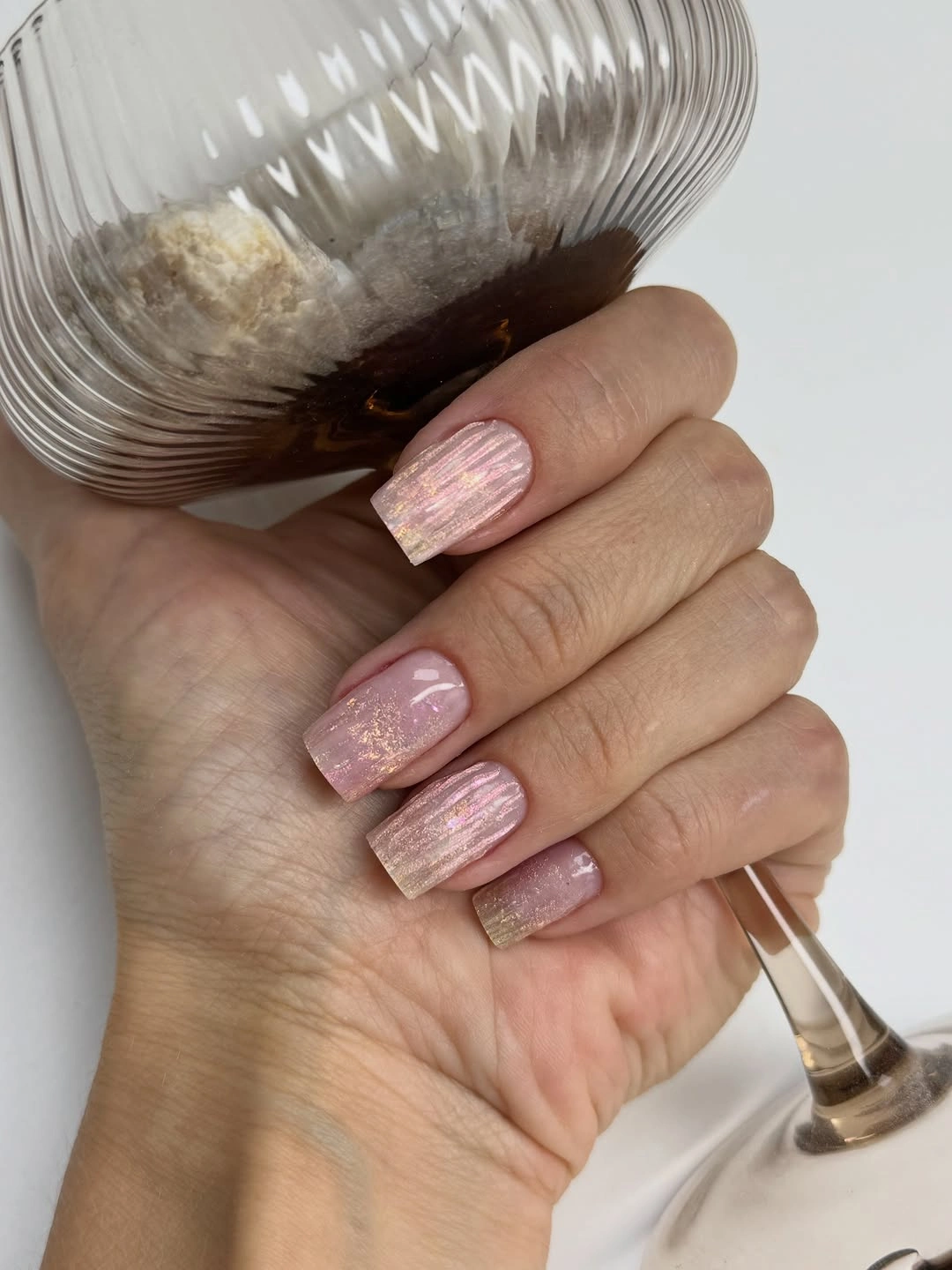 Medium pale pink square nails with fine shimmer