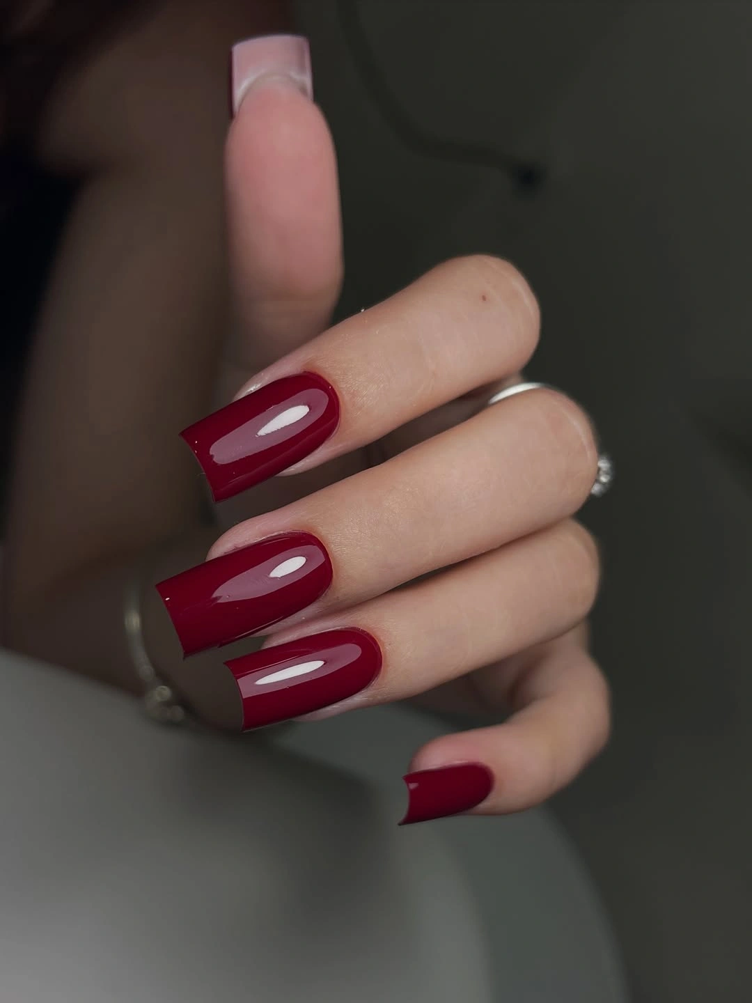 Long glossy wine-red square nails with straight tips