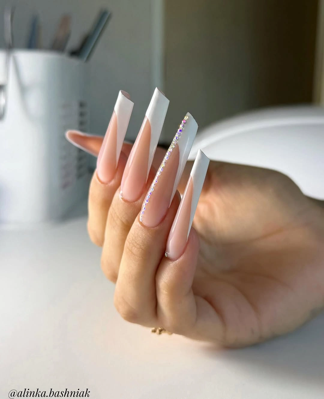 Extra long nails with white diagonal framing