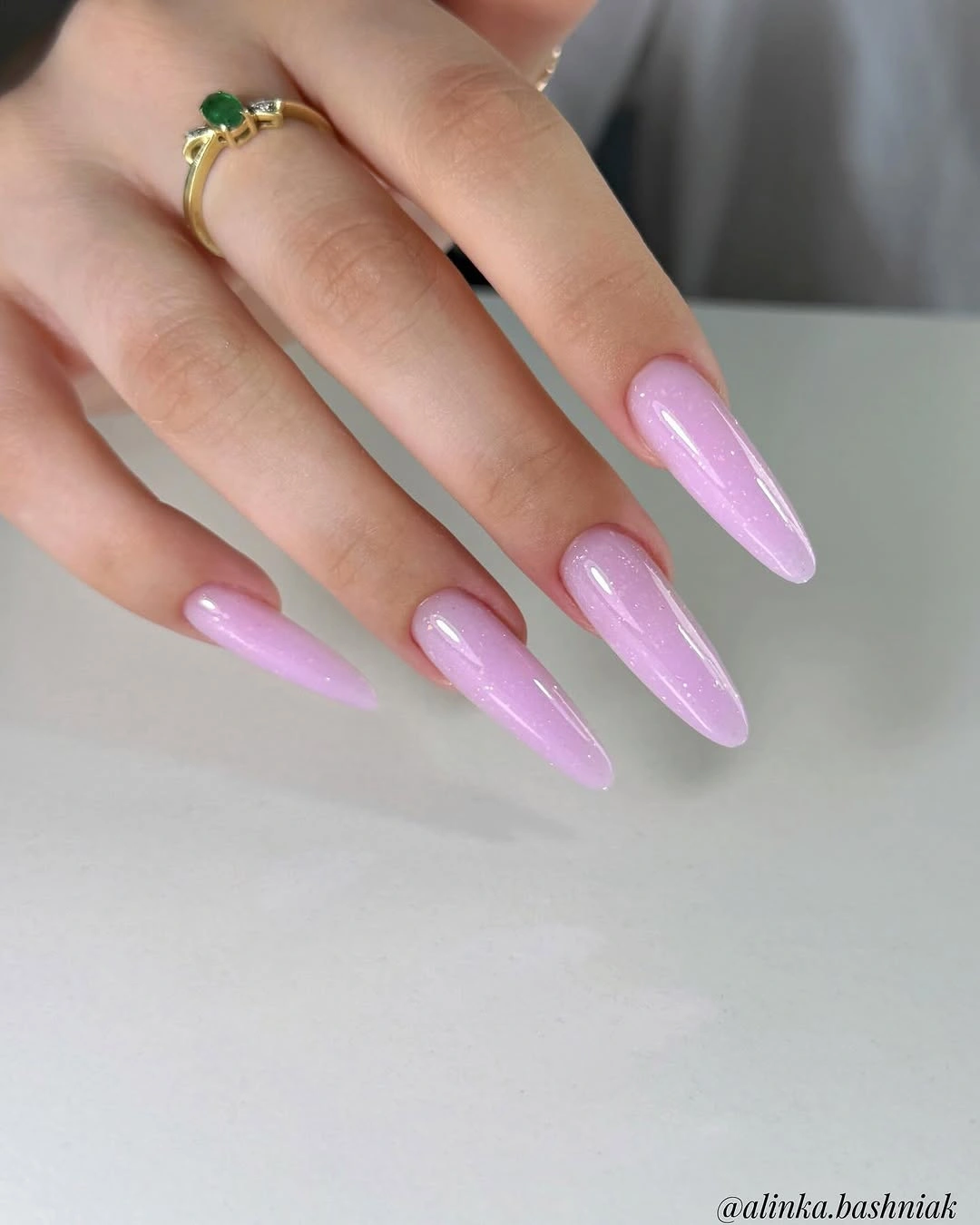 Lavender pink shimmer on long tapered nails