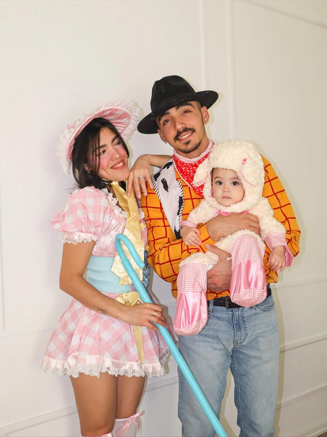 Family Halloween outfits with pink gingham western details and animal hood
