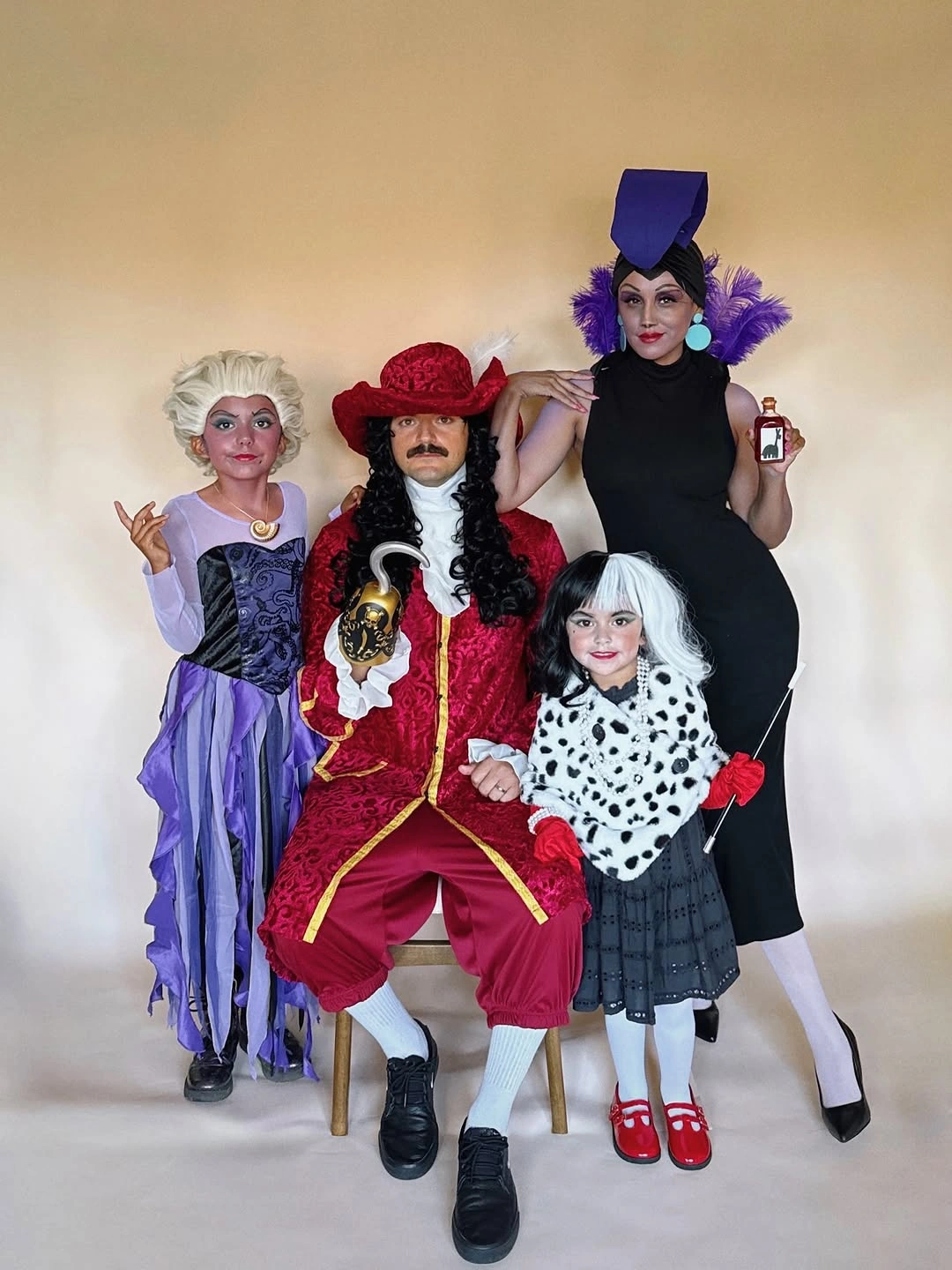 Family costumes in purple red black and spotted pattern