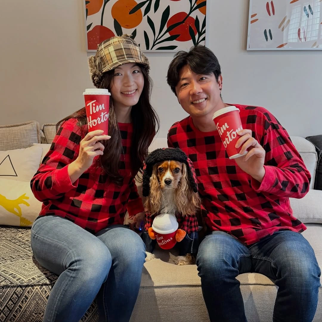 Family costumes in red black plaid with matching dog detail