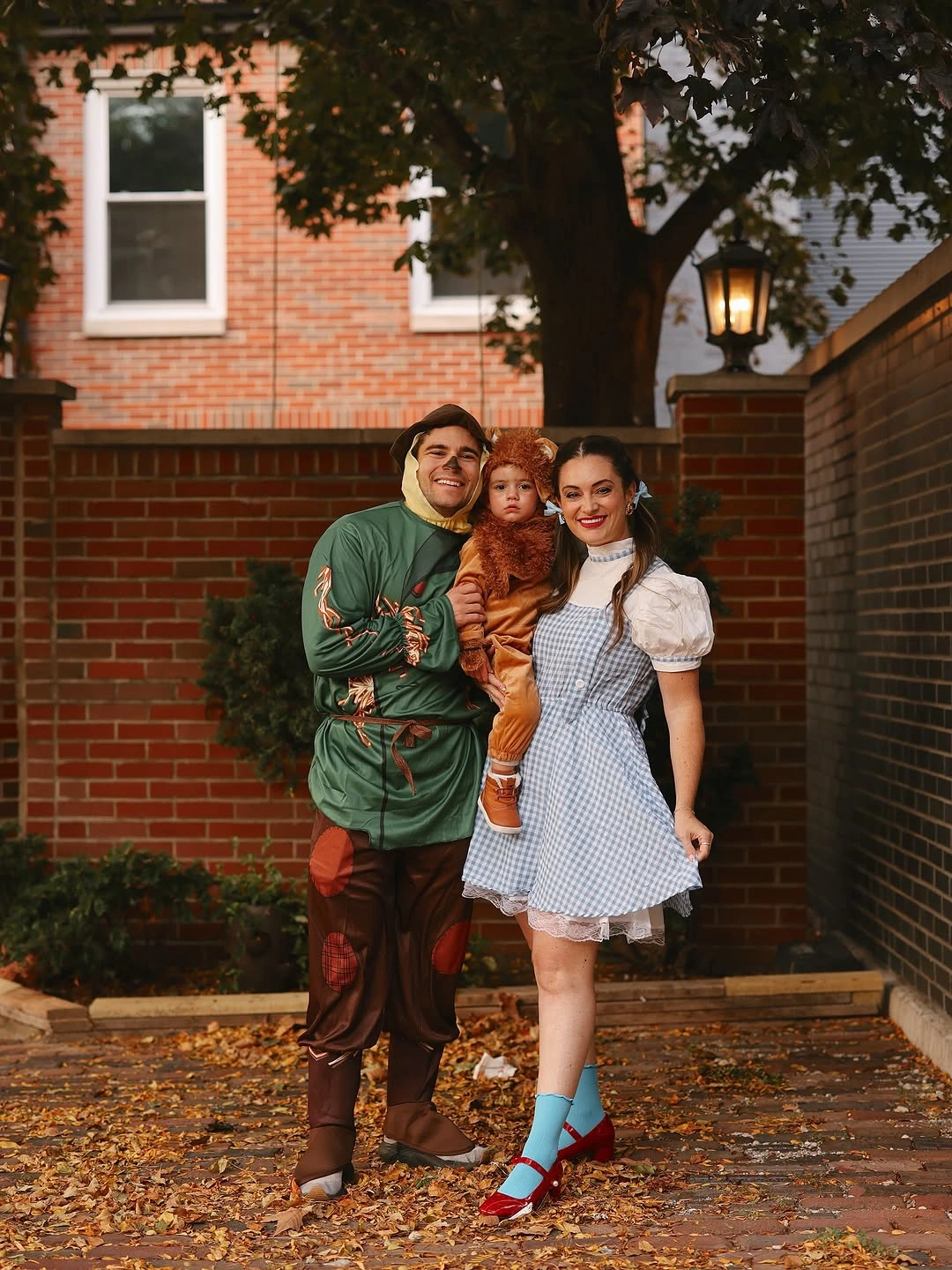 Family costumes with bright green outfit and white dress accents