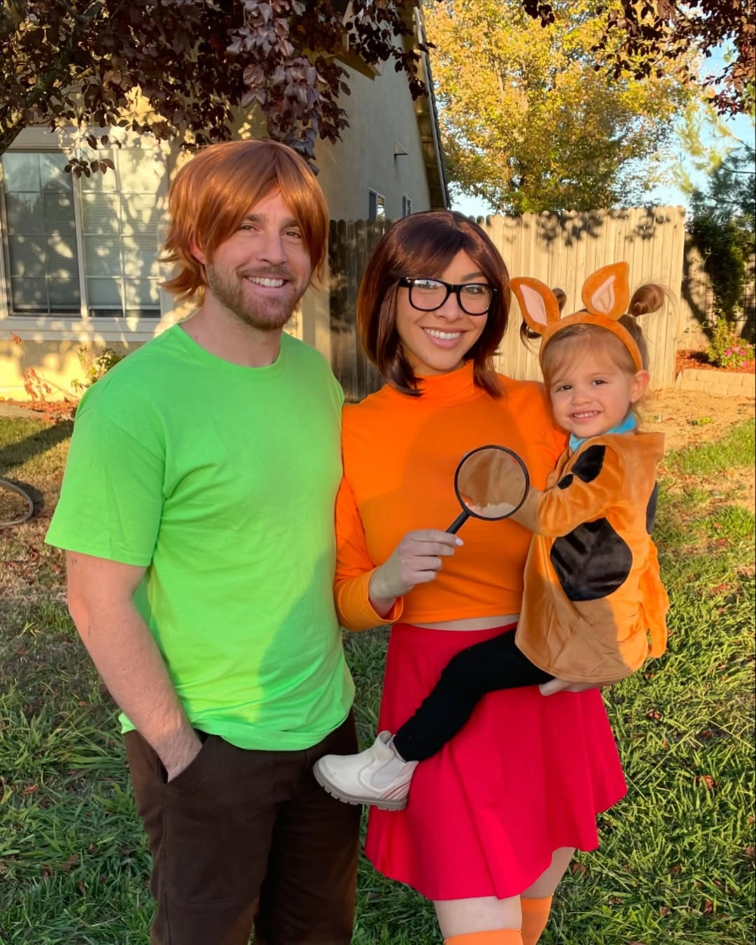 Family Halloween costumes in green orange with playful animal hood
