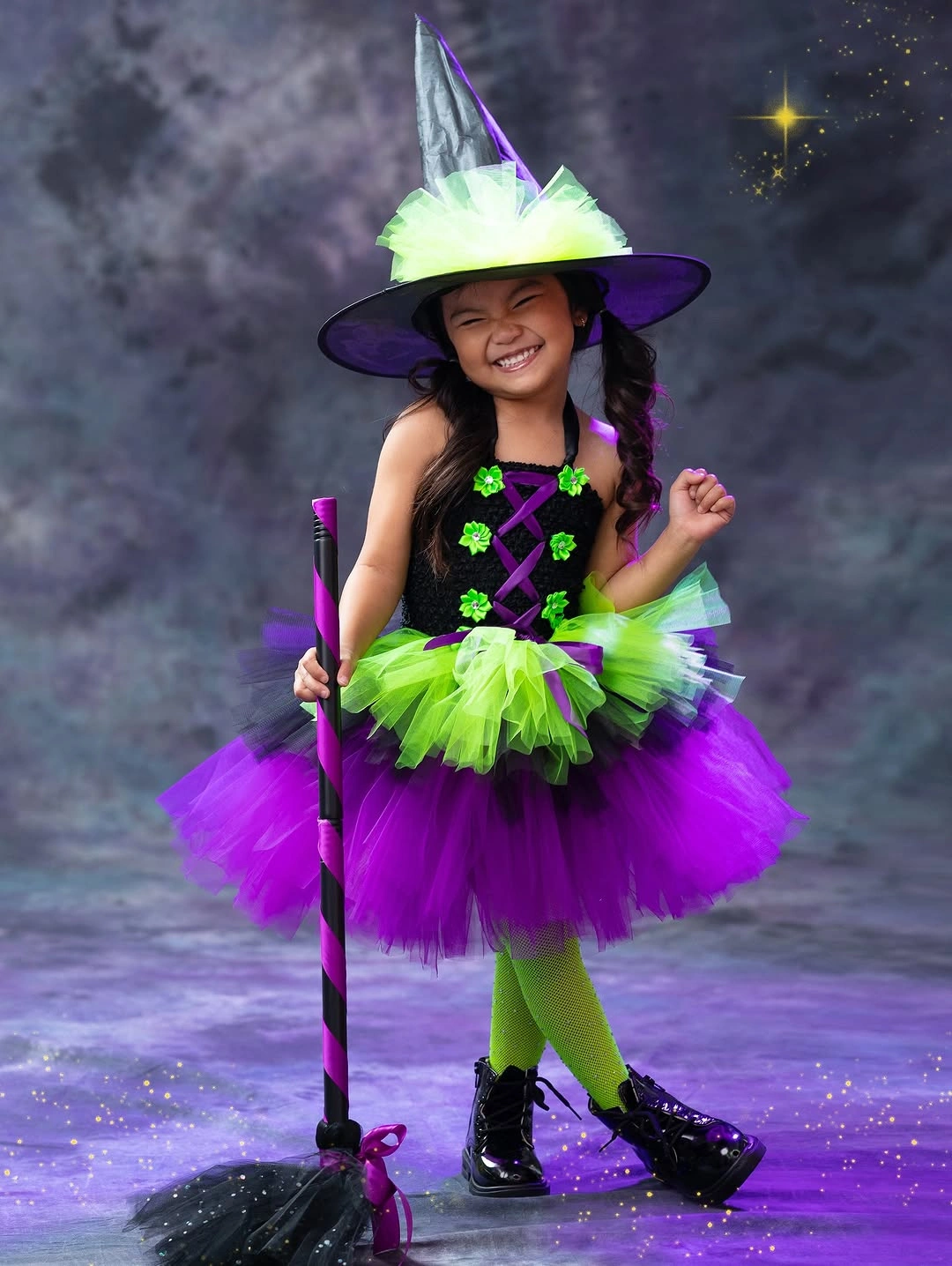 Girl witch costume with black bodice neon green purple tutu