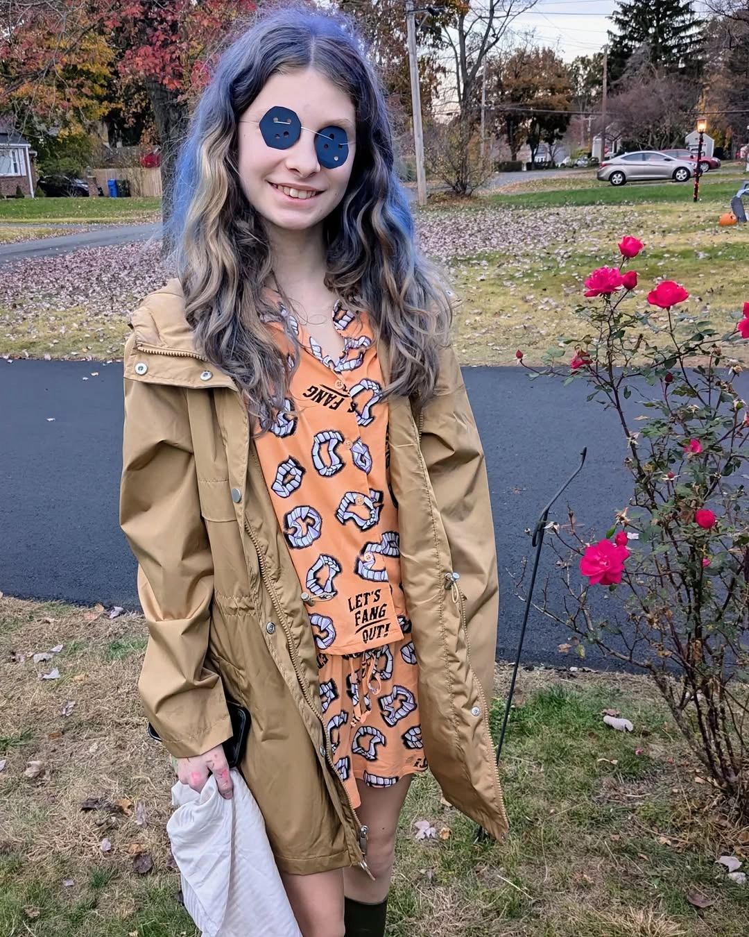 Girl Halloween costume with tan character print and beige coat