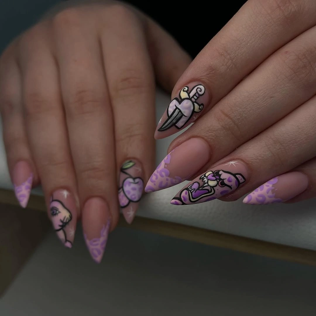Long stiletto nails with pastel pink purple spooky characters