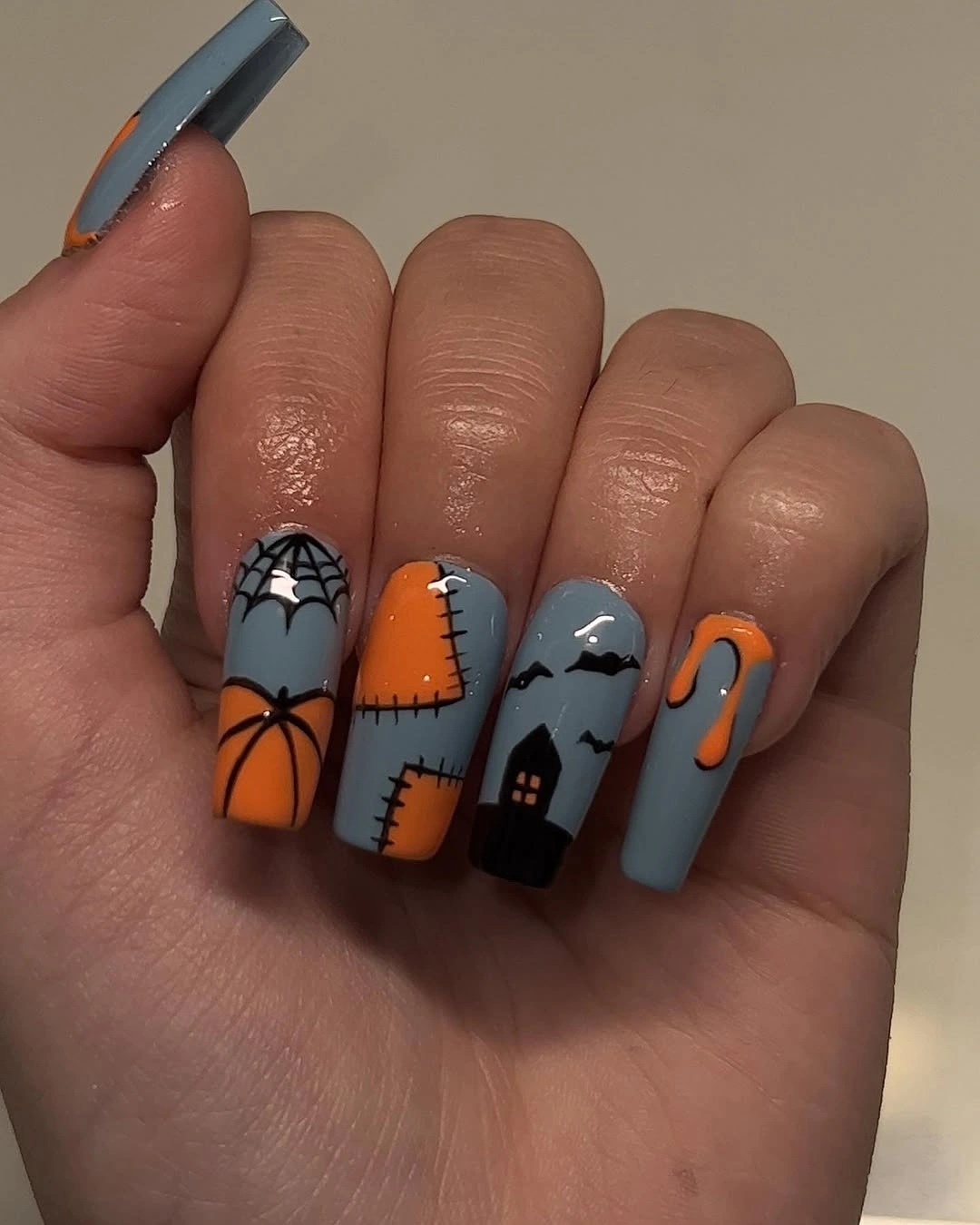Medium coffin nails with blue gray pumpkin and web panels
