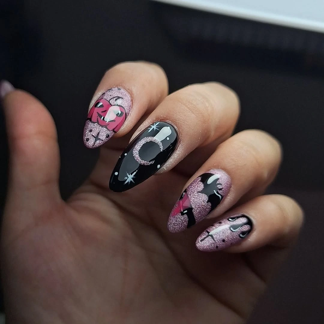 Almond nails with purple black ghosts moons and stars
