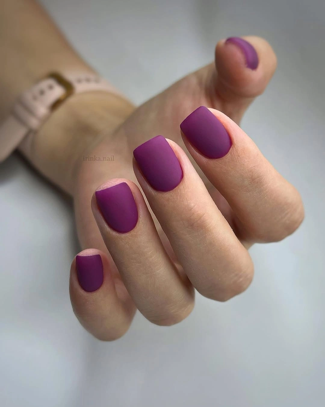 Short square nails in saturated matte berry purple color