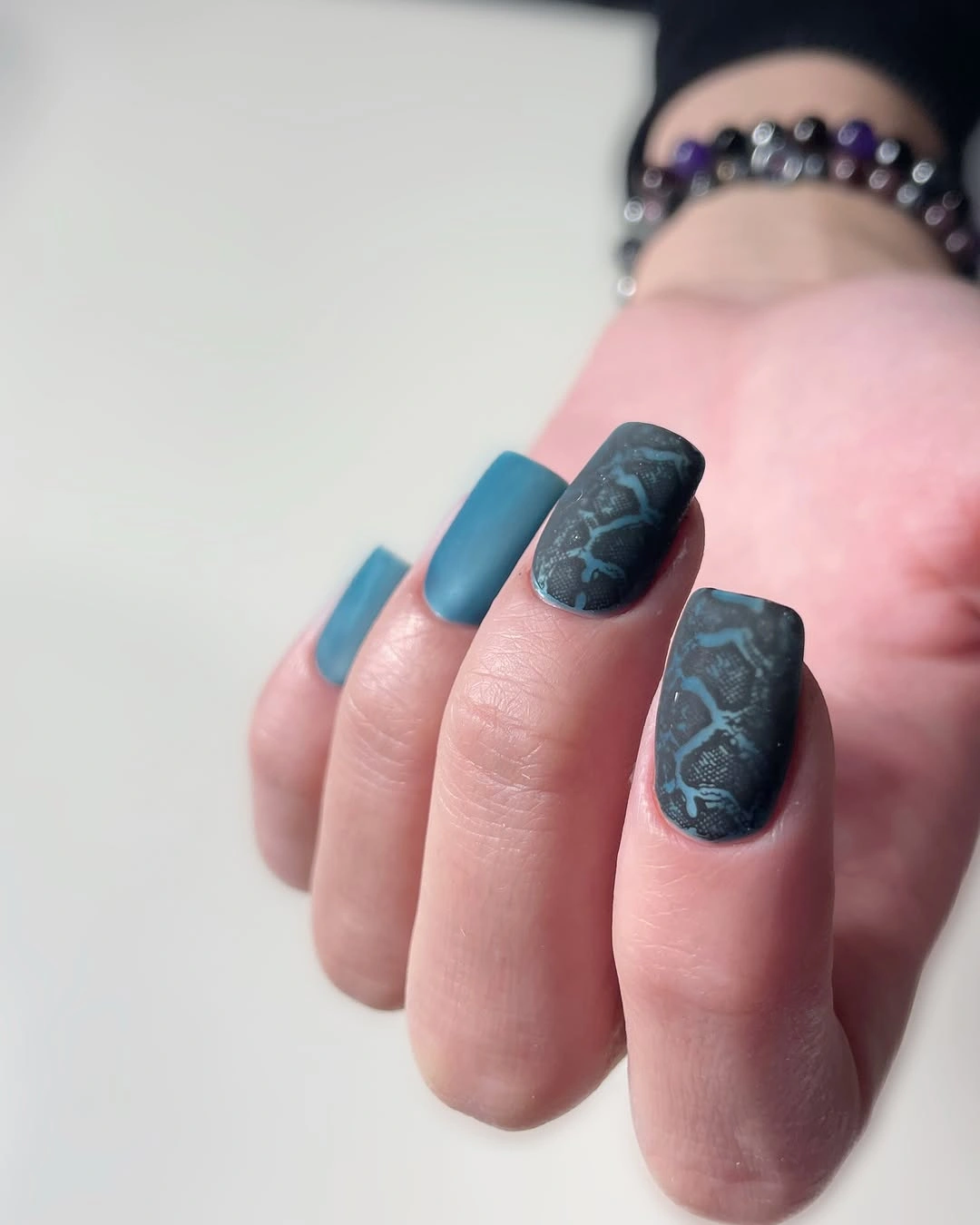 Charcoal matte square nails with subtle smoky blue-gray marbled swirls