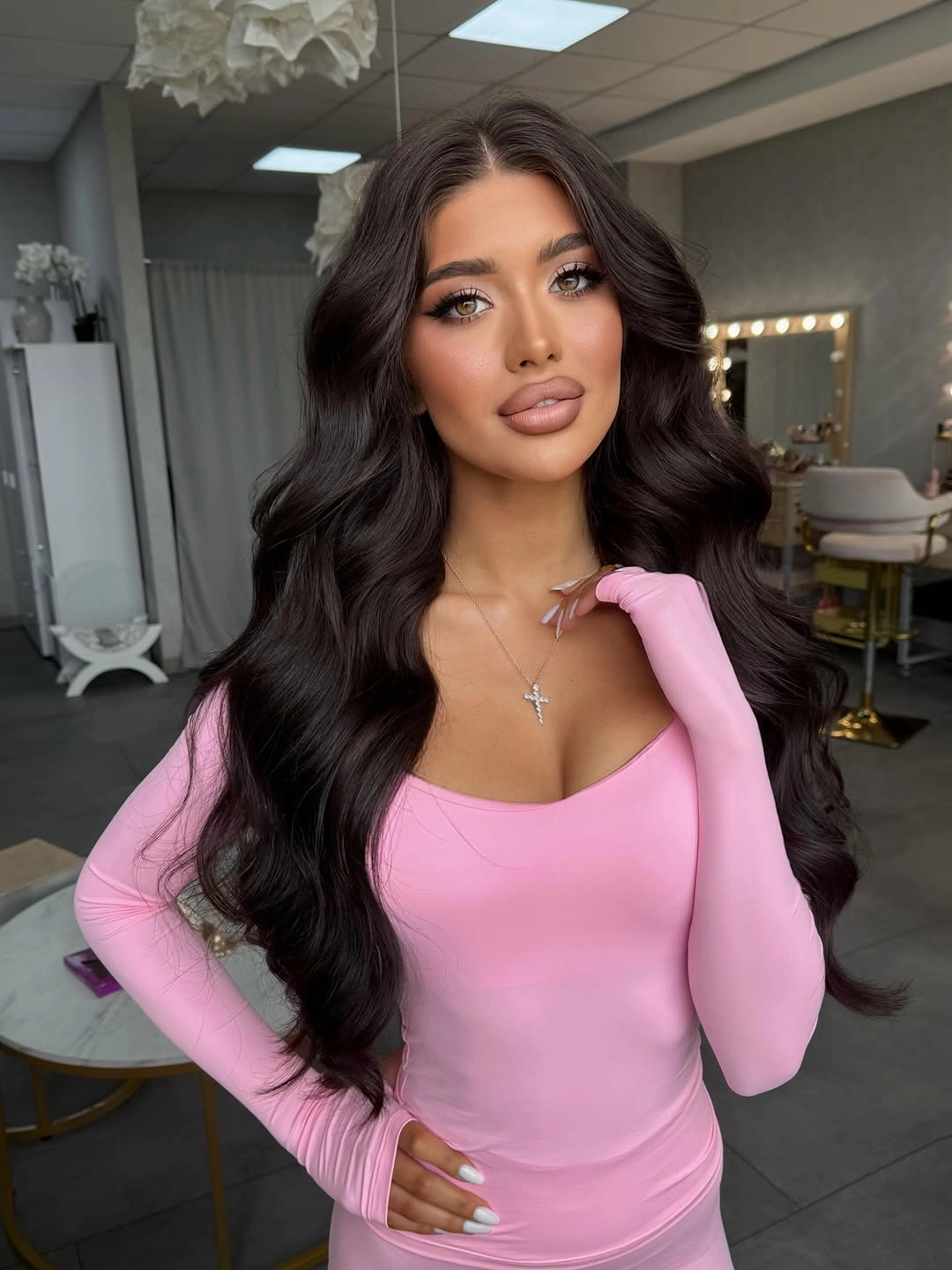 long dark center part with large glossy waves