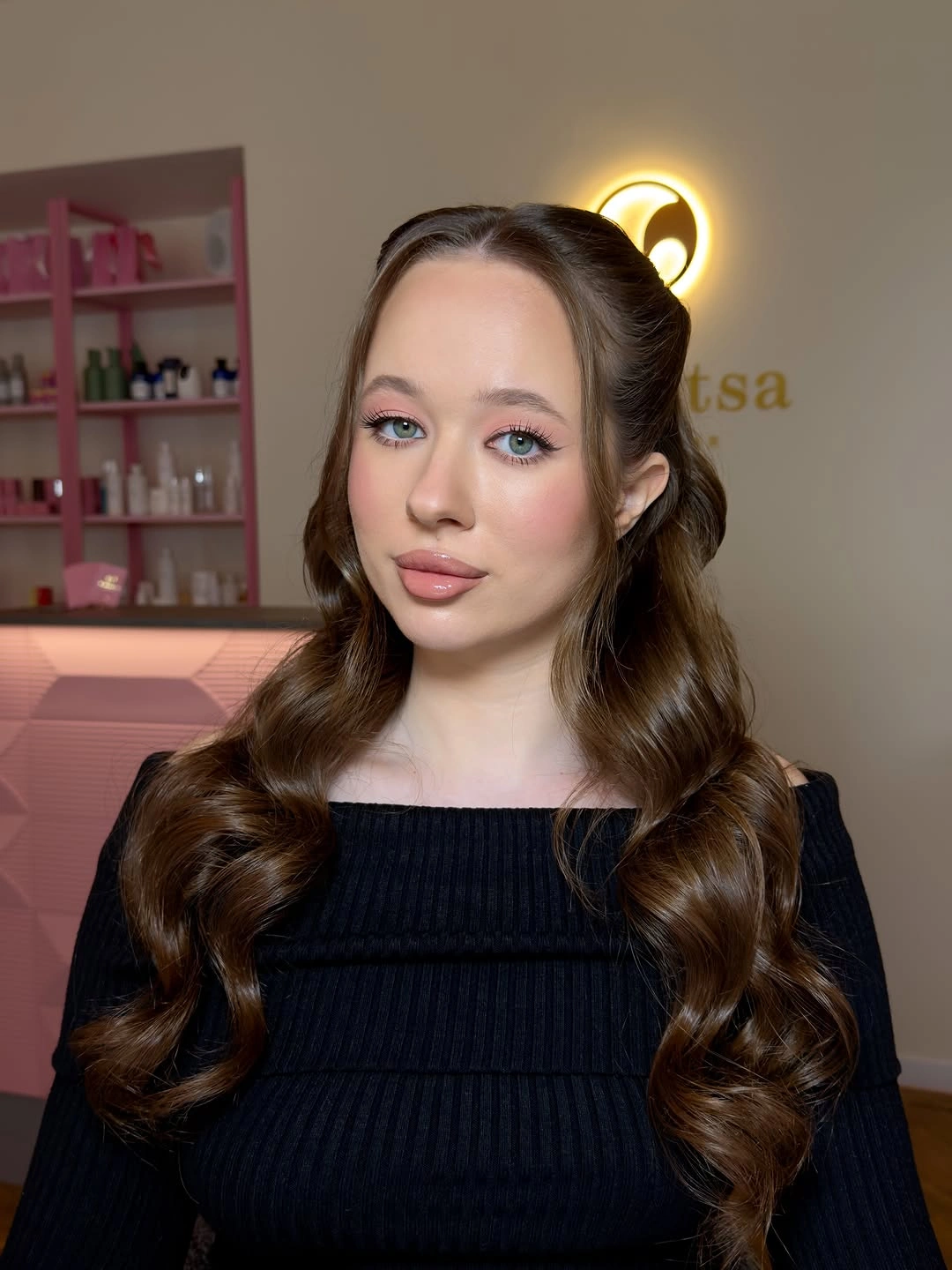 brown middle part half up style with soft shoulder curls