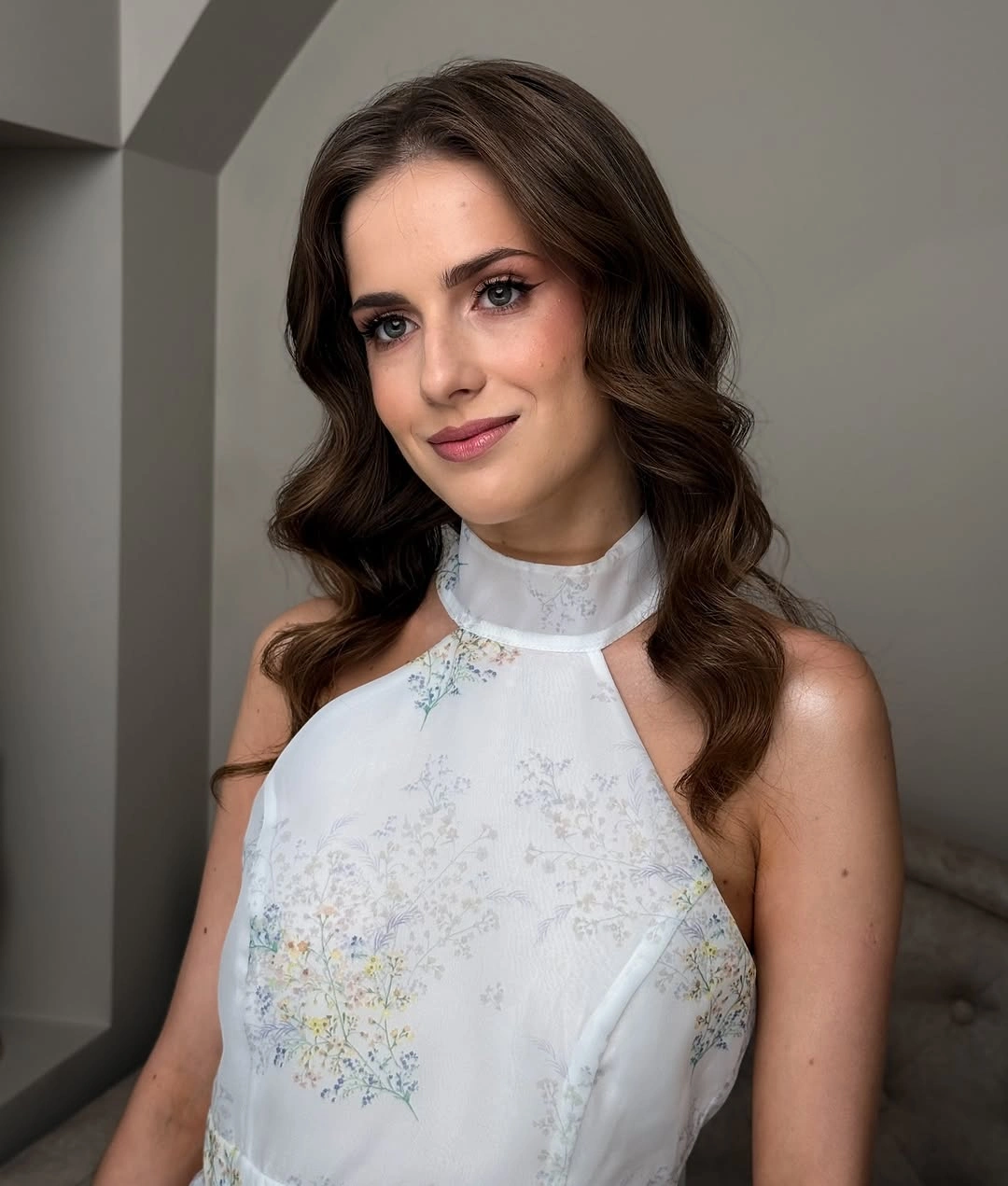 long brown middle part with brushed rounded waves