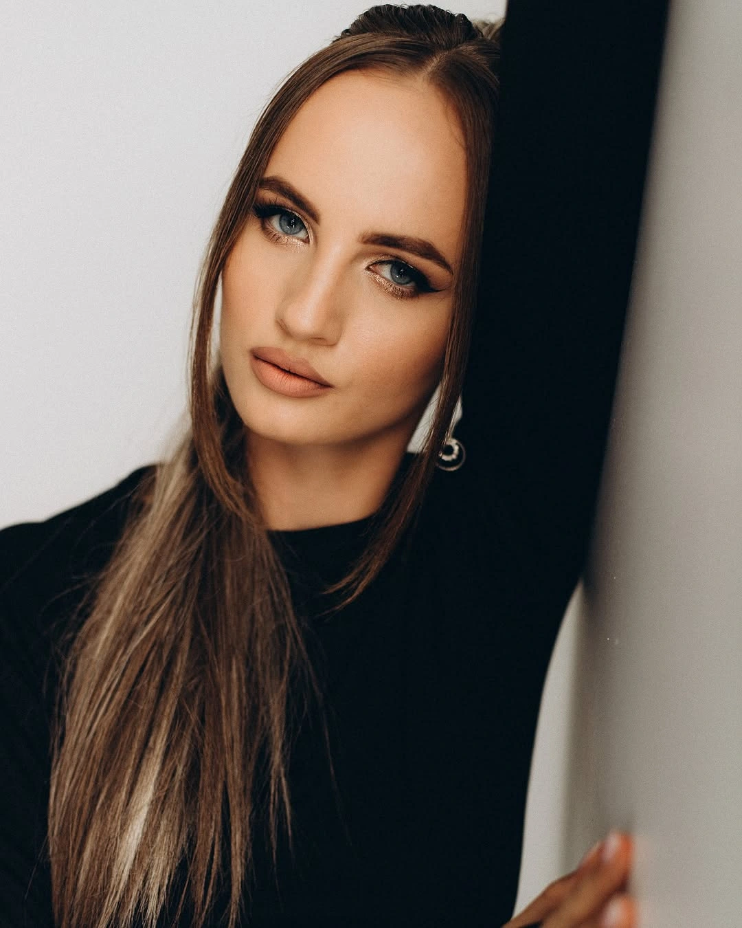 long straight middle part with face framing front pieces
