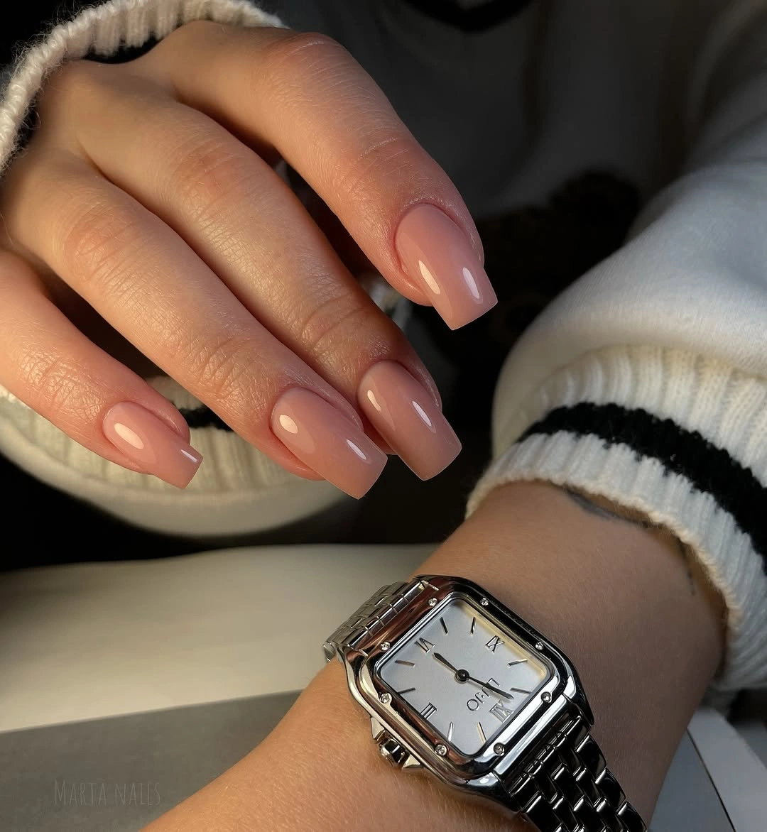 Medium glossy peach pink almond nails