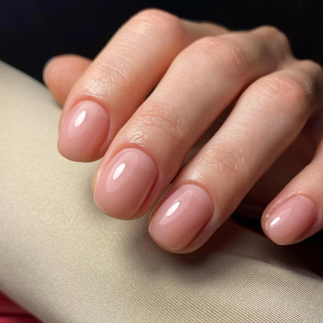 Short glossy soft blush oval nails