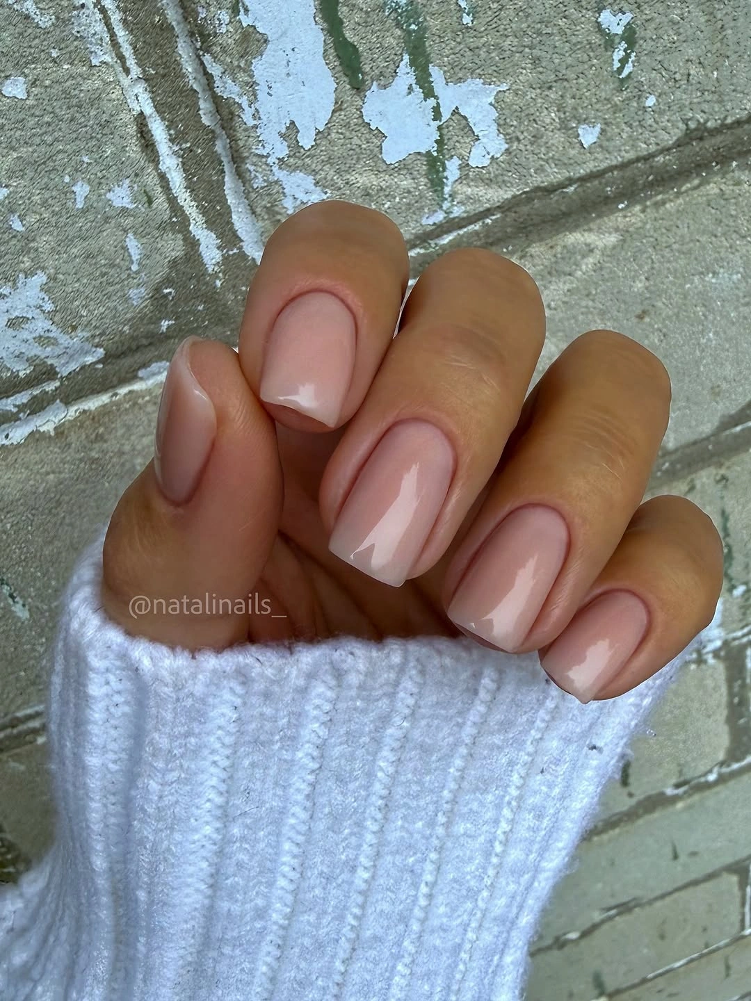 Short rounded glossy blush pink nails
