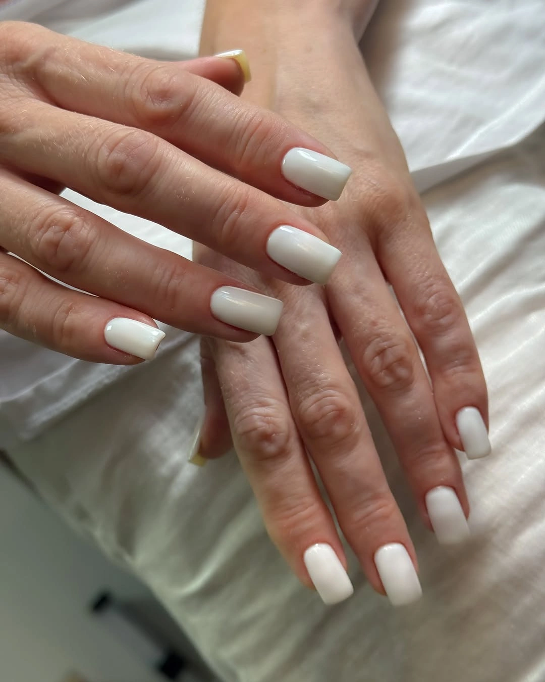 Medium glossy soft white square nails