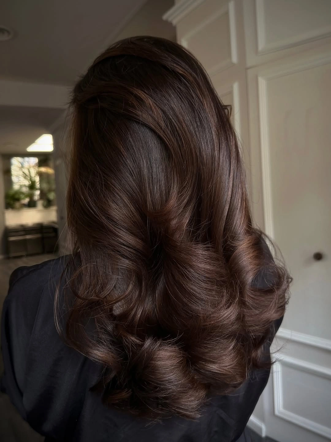 Dark brown loose twist with curled lengths left down