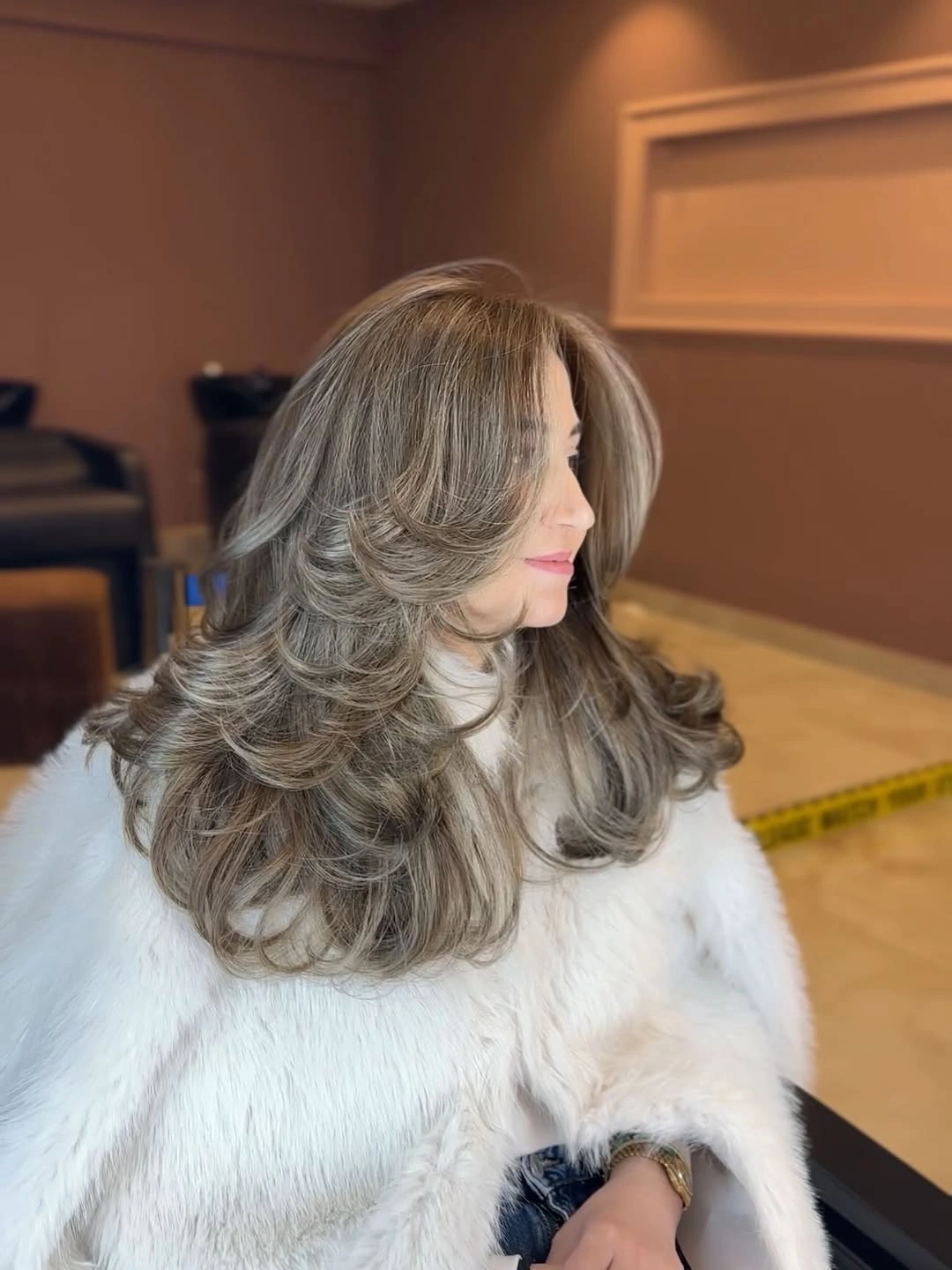 Gray-beige layered blowout with rounded turned ends